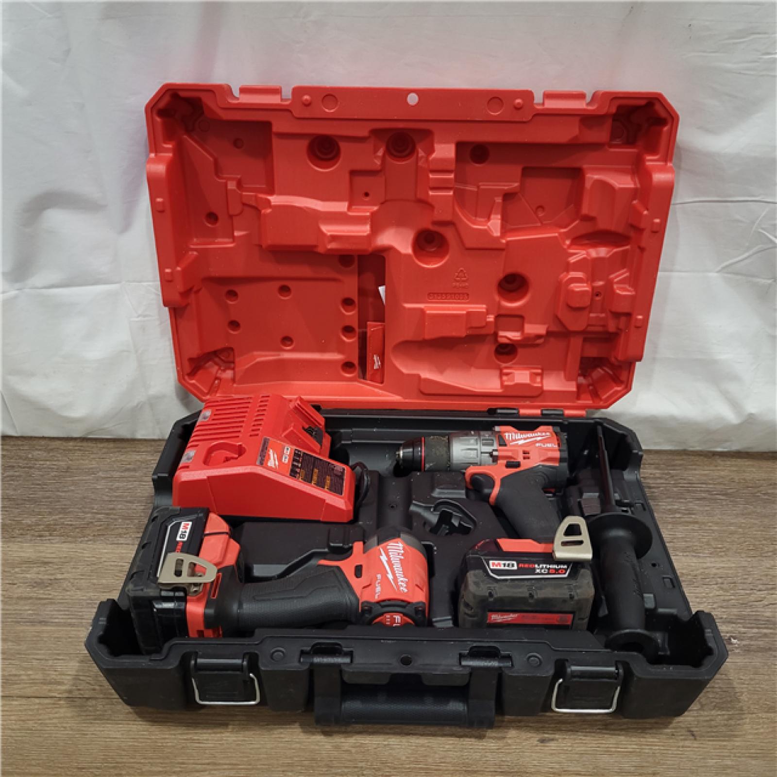 AS-IS Milwaukee M18 FUEL 18V Lithium-Ion Brushless Cordless Hammer Drill and Impact Driver Combo Kit (2-Tool) with 2 Batteries