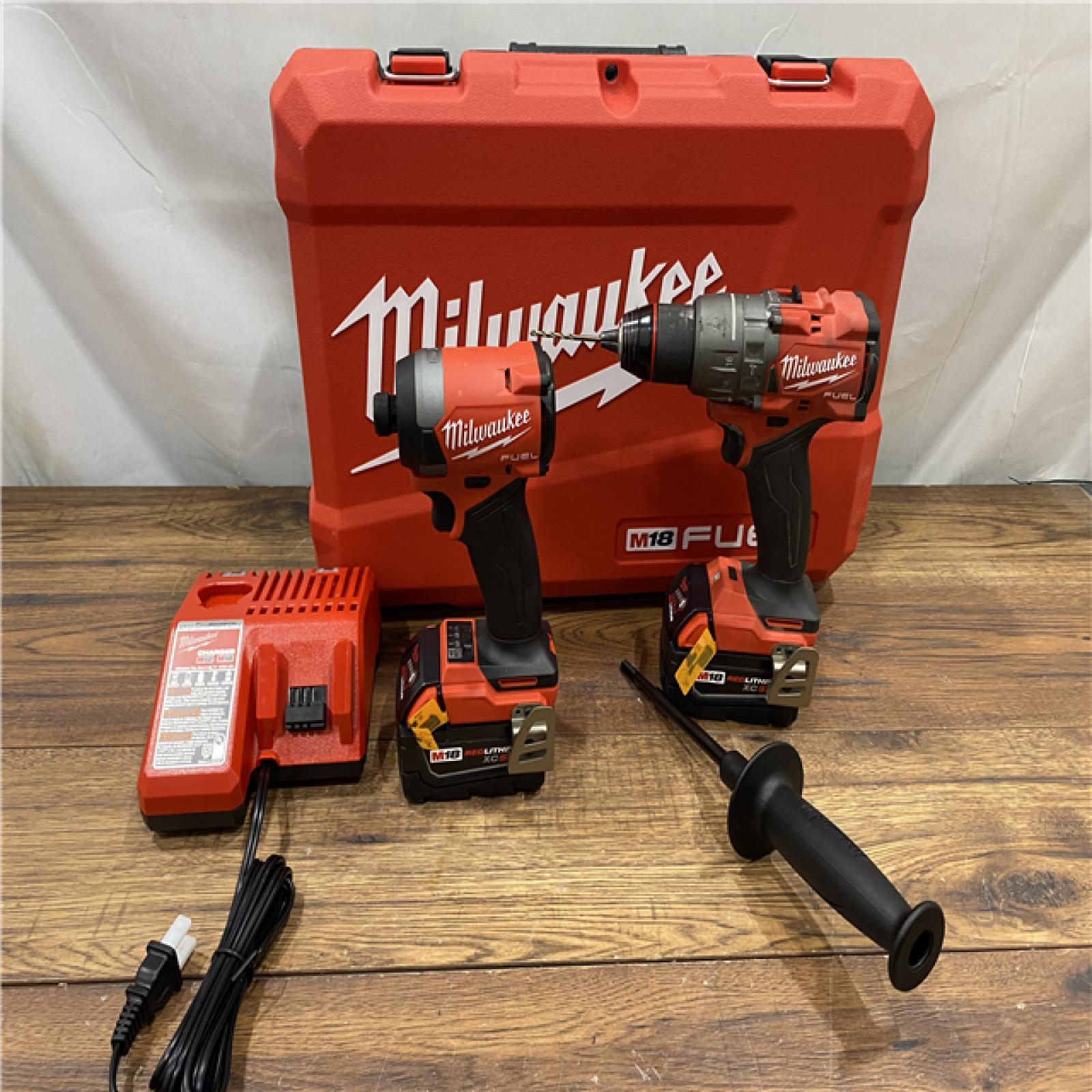 AS IS Milwaukee M18 FUEL 18V Lithium-Ion Brushless Cordless Hammer Drill and Impact Driver Combo Kit (2-Tool) with 2 Batteries