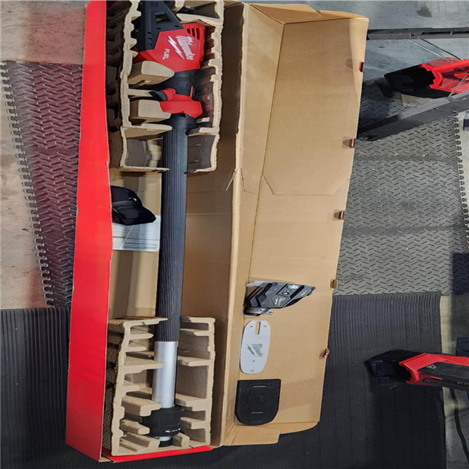 HOUSTON LOCATION - AS-IS (APPEARS LIKE NEW) Milwaukee M18 FUEL 10 in. 18V Lithium-Ion Brushless Electric Cordless Telescoping Pole Saw, 13 Ft. Length (Tool-Only)