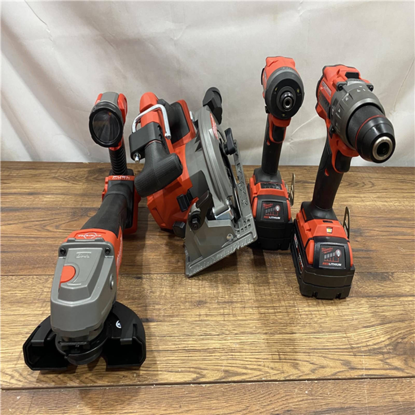 AS IS M18 18-Volt Lithium-Ion Brushless Cordless FUEL Combo Kit (5-Tool) with 2-Batteries, 1-Charger, and Tool Bag