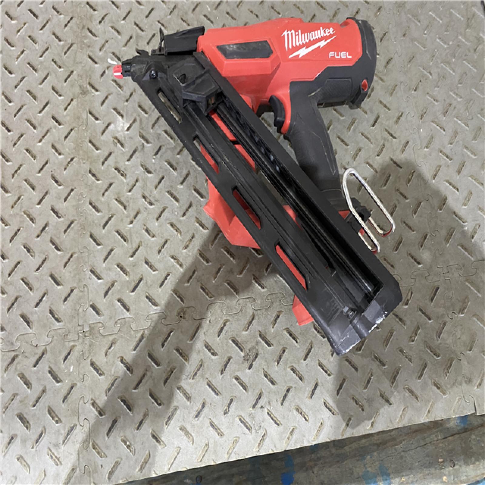 Houston location AS-IS Milwaukee 2839-20 M18 FUEL 15 Ga. 18 Volt Brushless Angled Finish Nailer