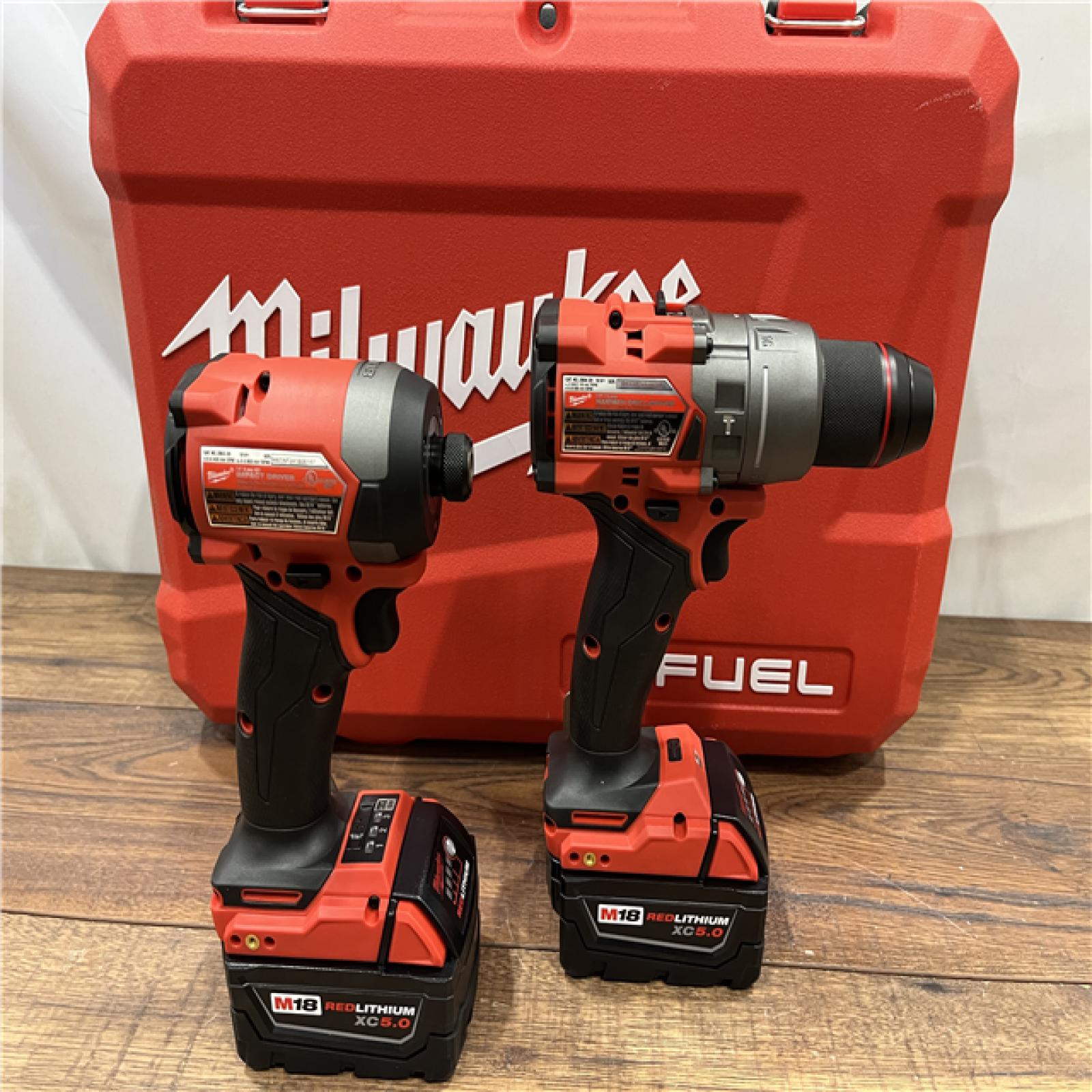 AS IS Milwaukee M18 FUEL 18V Lithium-Ion Brushless Cordless Hammer Drill and Impact Driver Combo Kit (2-Tool) with 2 Batteries