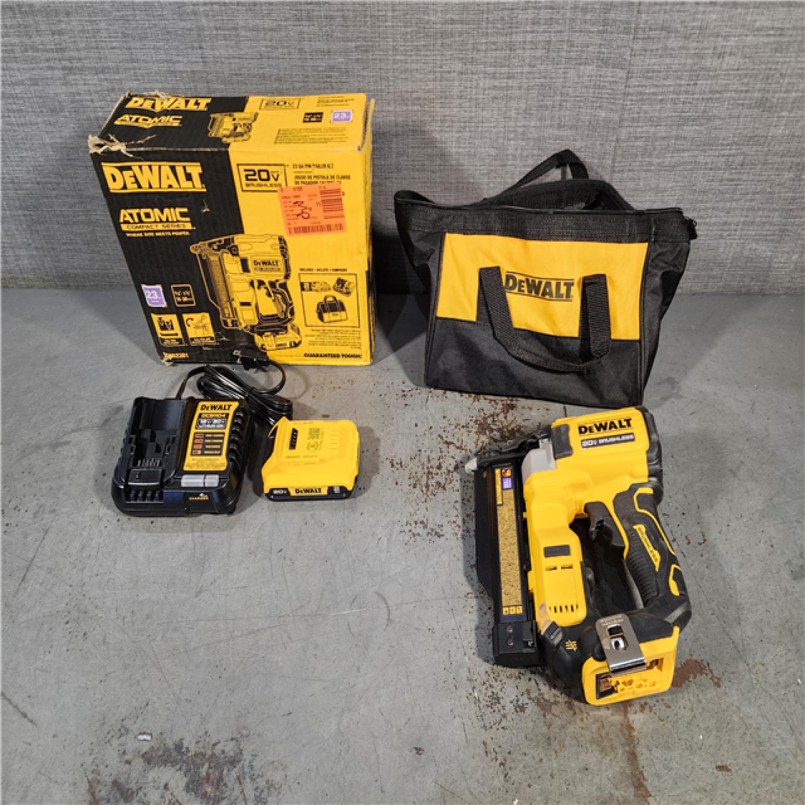 HOUSTON LOCATION - AS-IS DEWALT ATOMIC 20V MAX Lithium Ion Cordless 23 Gauge Pin Nailer Kit with 2.0Ah Battery and Charger