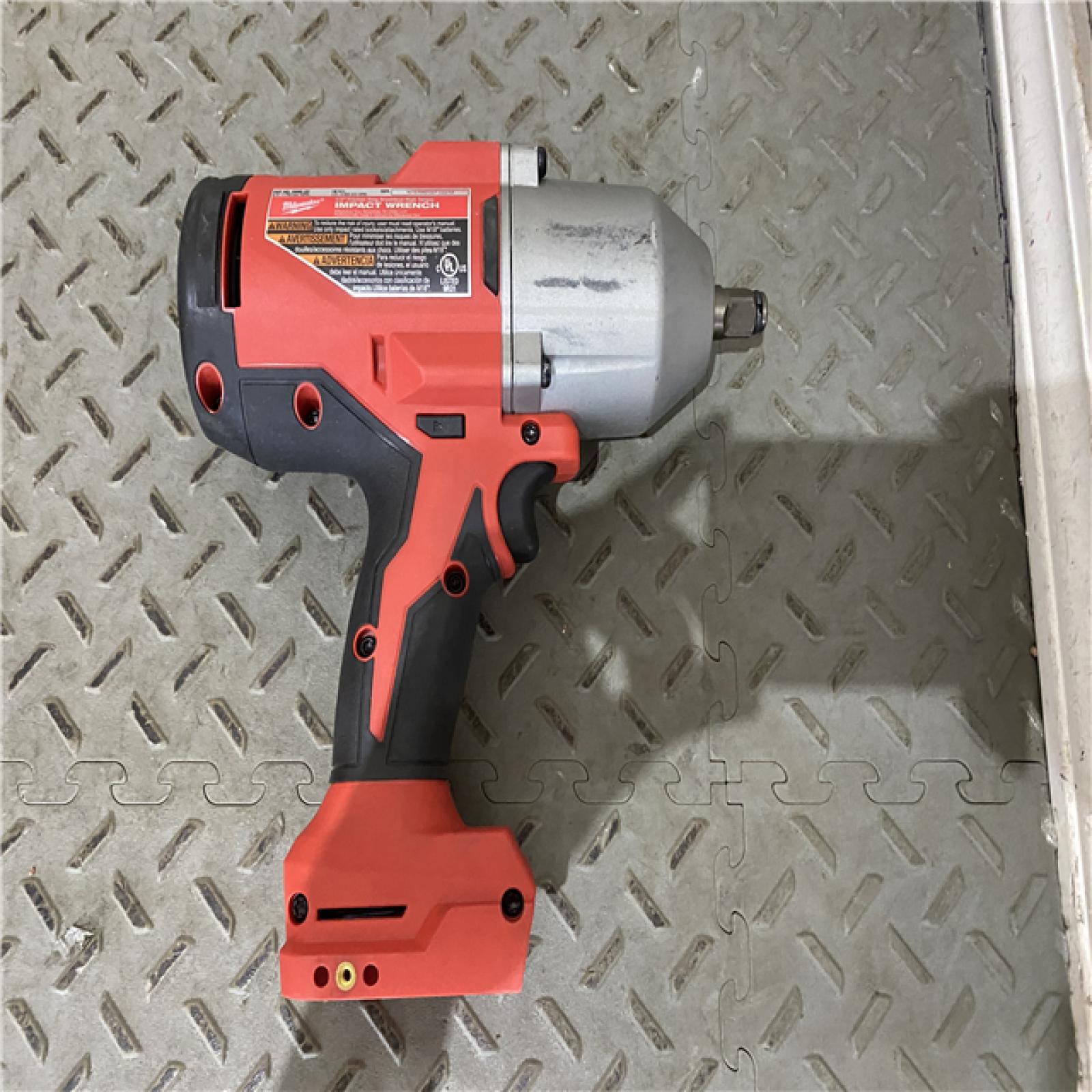 Houston location AS-IS Milwaukee 2666-20 M18 18-Volt Lithium-Ion Brushless 1/2 in. High Torque Impact Wrench with Friction Ring (Tool-Only)