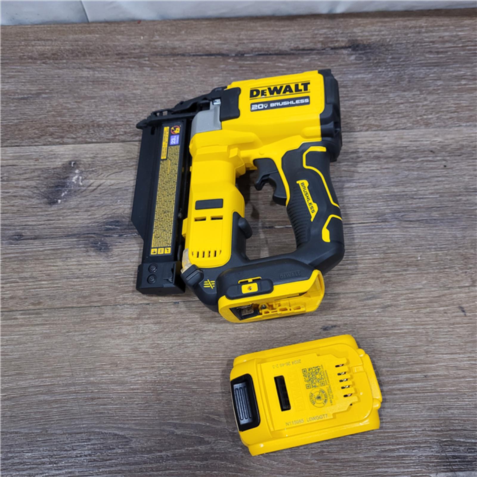 AS-IS DEWALT ATOMIC 20V MAX Lithium Ion Cordless 23 Gauge Pin Nailer Kit with 2.0Ah Battery and Charger