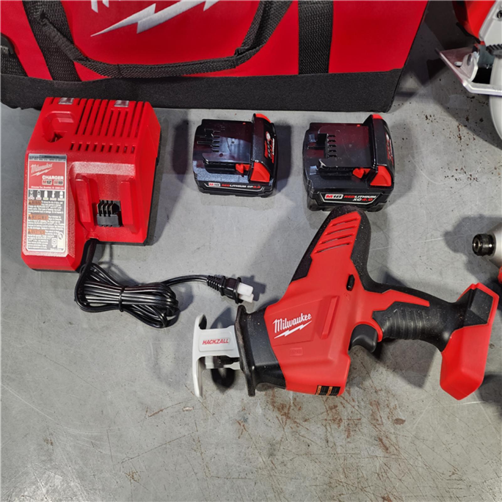 HOUSTON LOCATION - AS-IS Milwaukee M18 18-Volt Lithium-Ion Brushless Cordless Combo Kit (4-Tool) with 2-Batteries, 1-Charger and Tool Bag