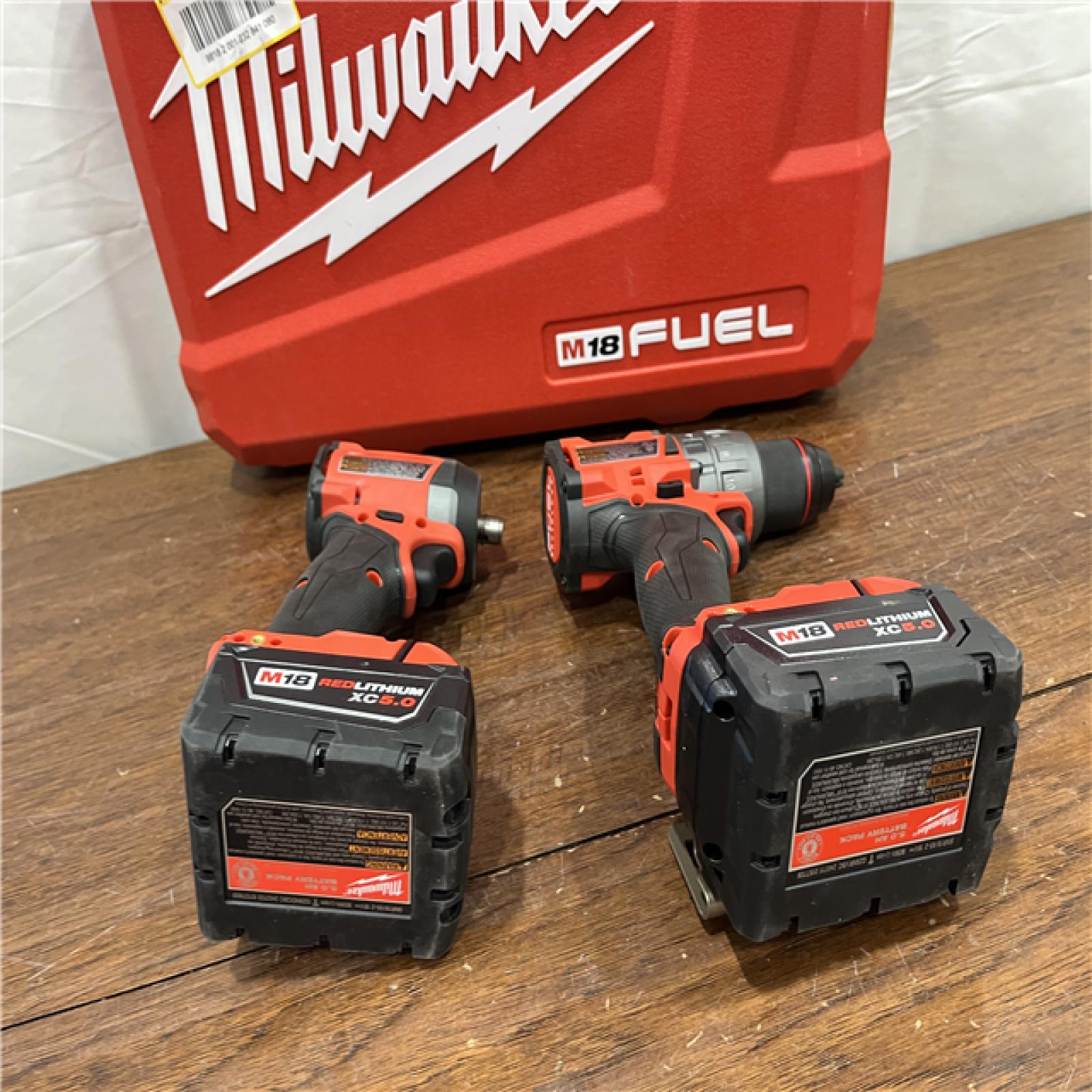 AS-IS Milwaukee M18 FUEL 18V Lithium-Ion Brushless Cordless Hammer Drill and Impact Driver Combo Kit (2-Tool) with 2 Batteries