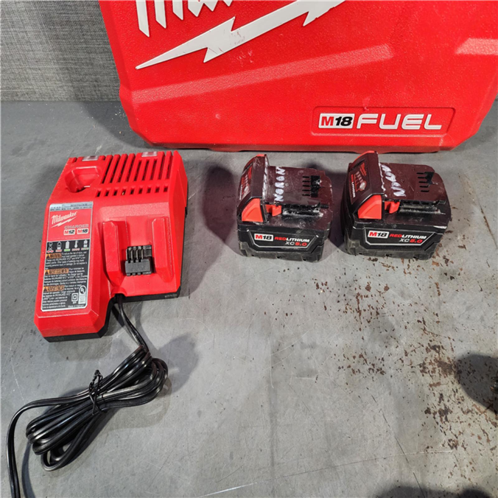 HOUSTON LOCATION - AS-IS Milwaukee M18 FUEL 18V Lithium-Ion Brushless Cordless Hammer Drill and Impact Driver Combo Kit (2-Tool) with 2 Batteries