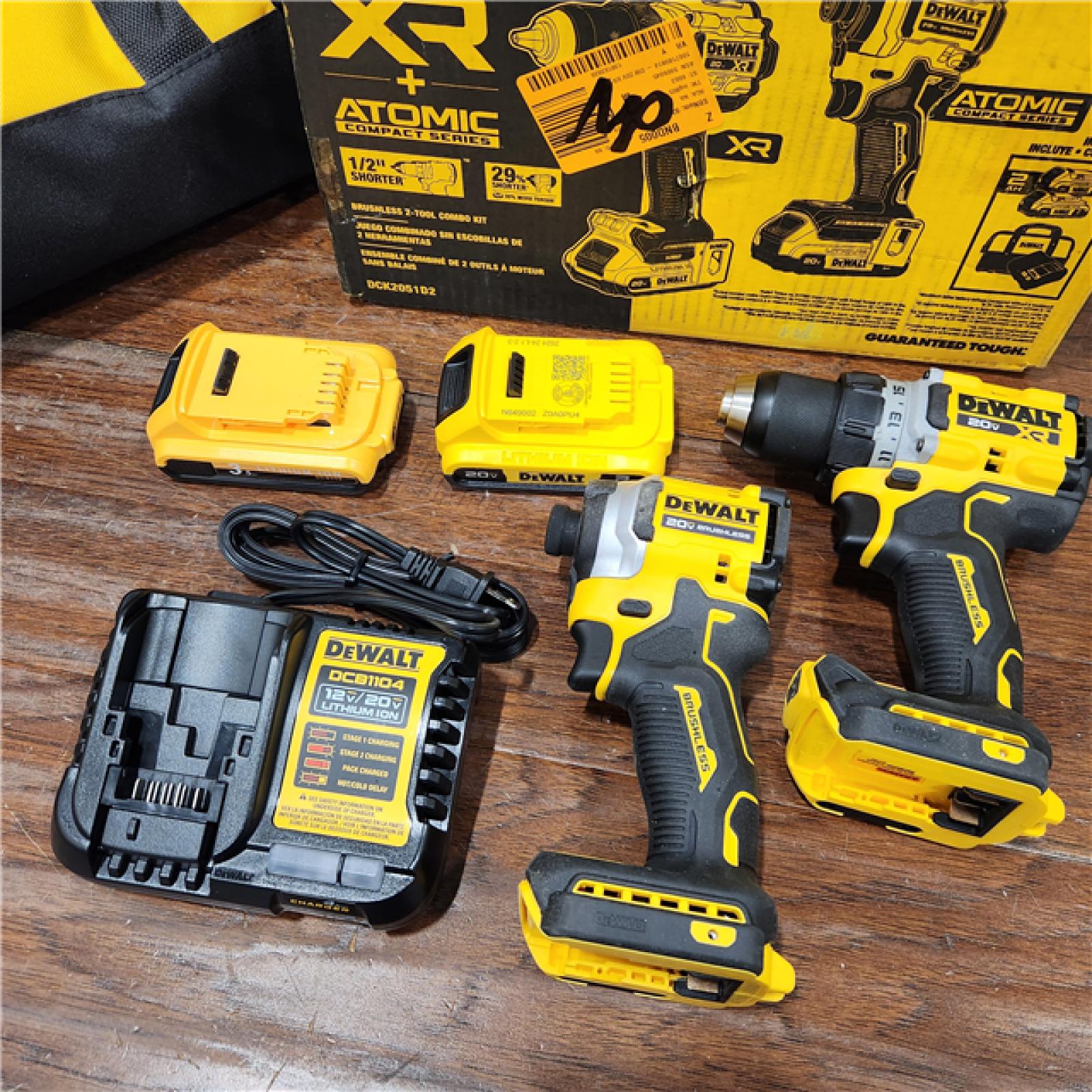 AS-IS DEWALT 20V MAX XR Cordless Drill/Driver, ATOMIC Impact Driver 2 Tool Combo Kit, (2) 2.0Ah Batteries, Charger, and Bag