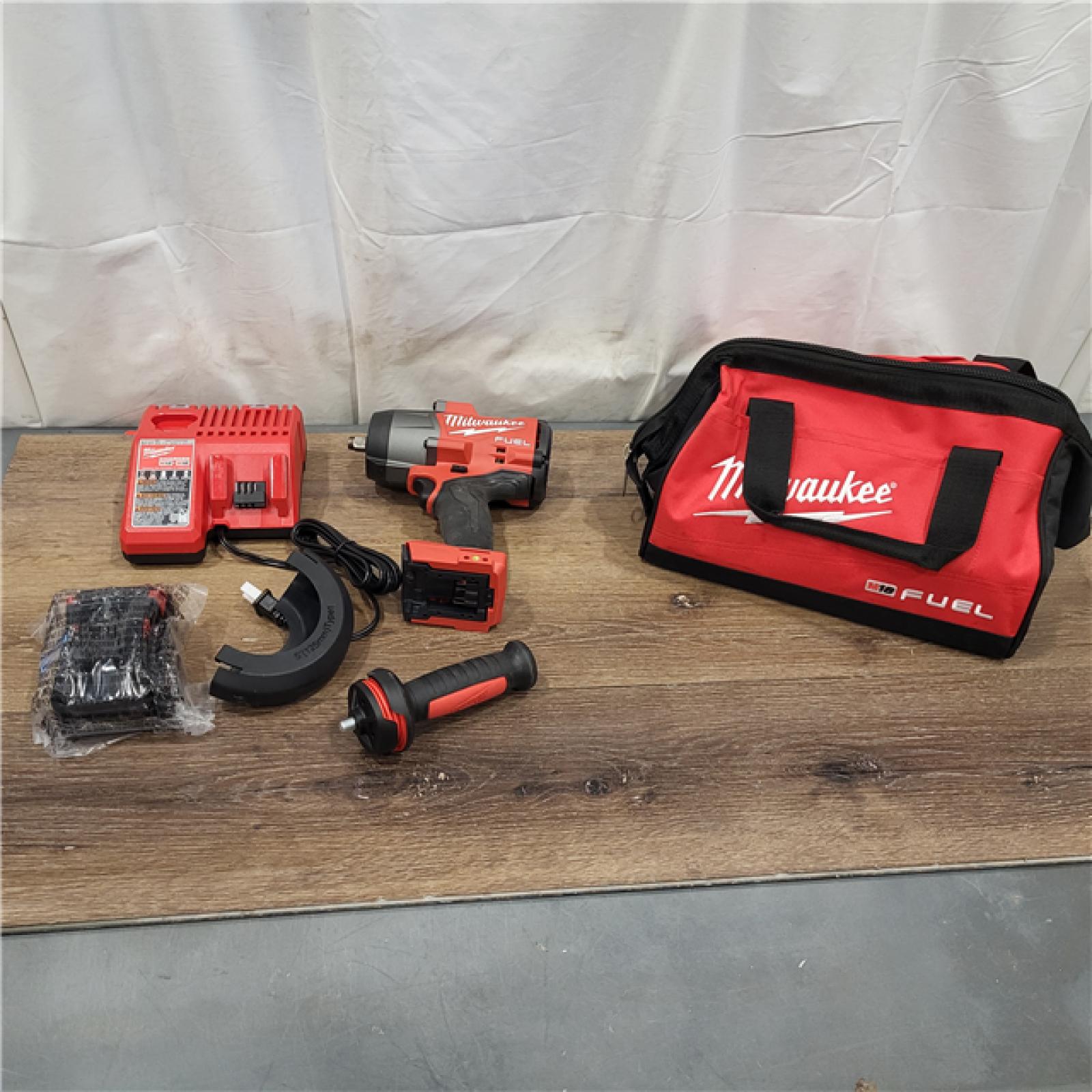 AS-IS Milwaukee M18 1/2 in. Cordless Brushless High Torque Impact Wrench Kit (Battery & Charger)