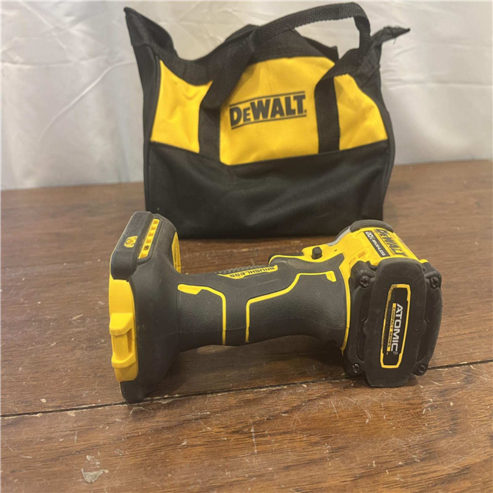 AS-ISDEWALT ATOMIC 20V MAX Lithium-Ion Cordless 1/4 in. Brushless Impact Driver Kit, 5 Ah Battery, Charger, and Bag