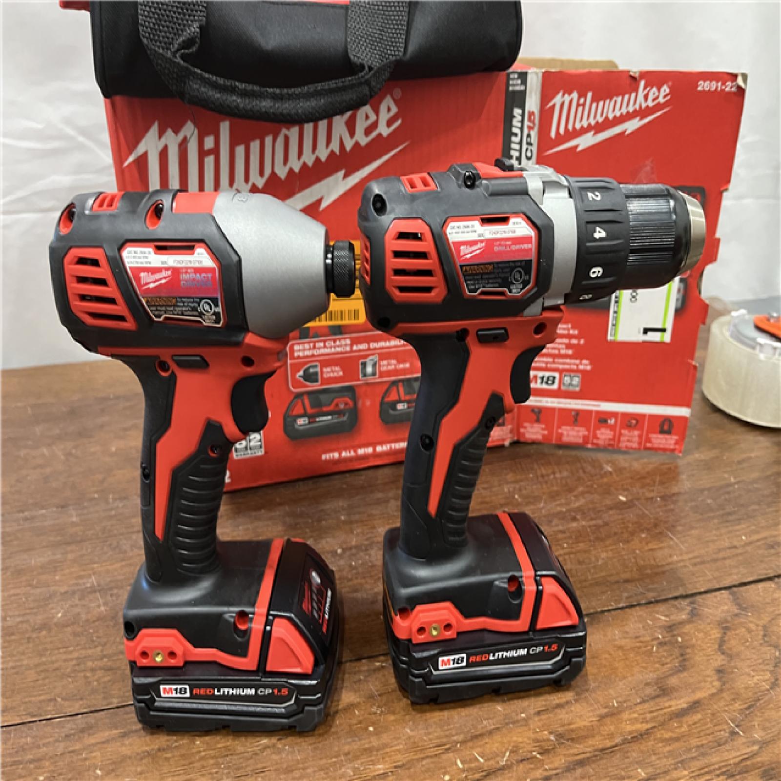 AS-ISMilwaukee M18 18V Cordless Brushed 2 Tool Drill/Driver and Impact Driver Kit