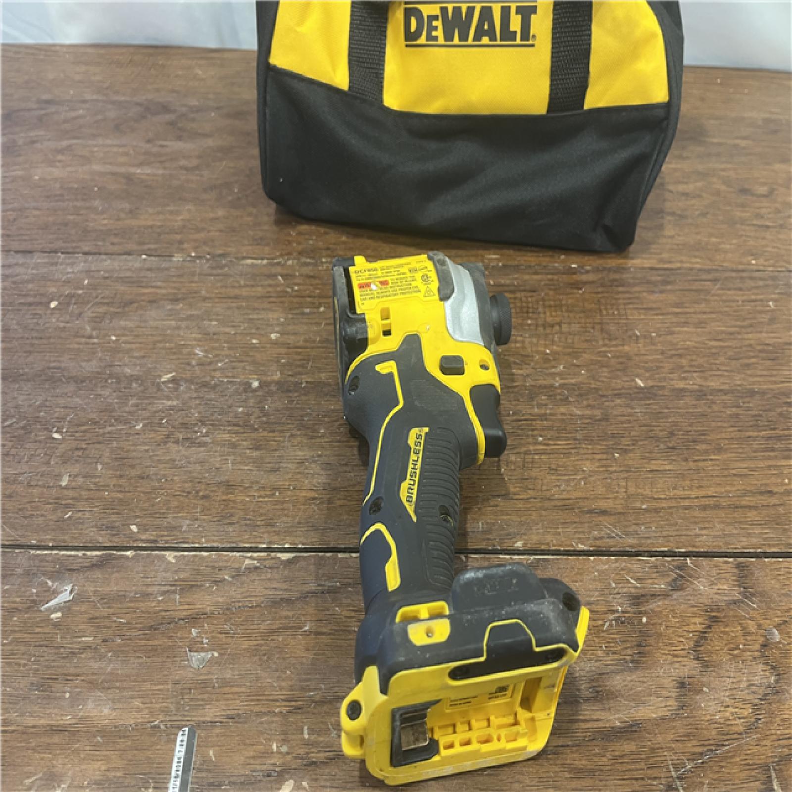 AS-ISDEWALT ATOMIC 20V MAX Lithium-Ion Cordless 1/4 in. Brushless Impact Driver Kit, 5 Ah Battery, Charger, and Bag