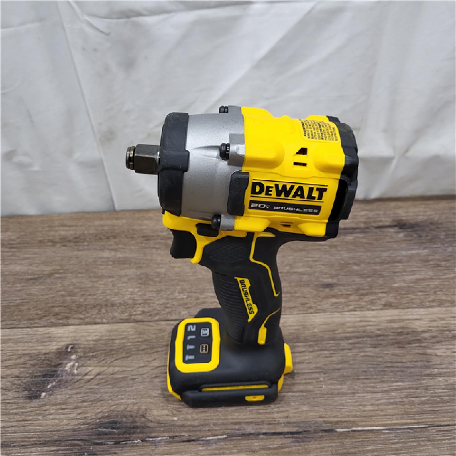 AS-IS DEWALT ATOMIC 20V MAX Lithium-Ion Brushless Cordless 1/2 in. Variable Speed Impact Wrench Kit with 5 Ah Battery and Charger