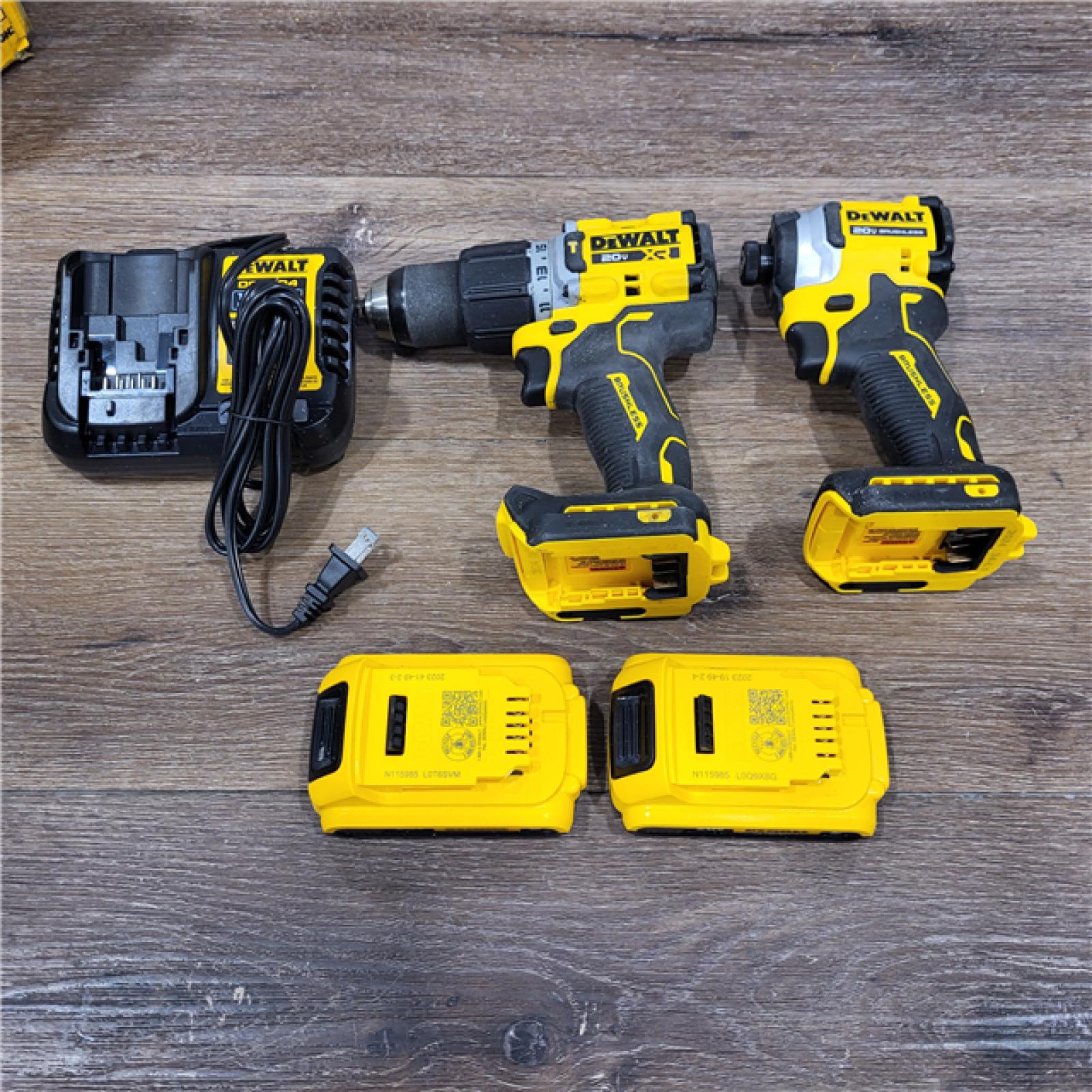 AS-IS 20V MAX XR Hammer Drill and ATOMIC Impact Driver 2 Tool Cordless Combo Kit with (2) 4.0Ah Batteries, Charger, and Bag