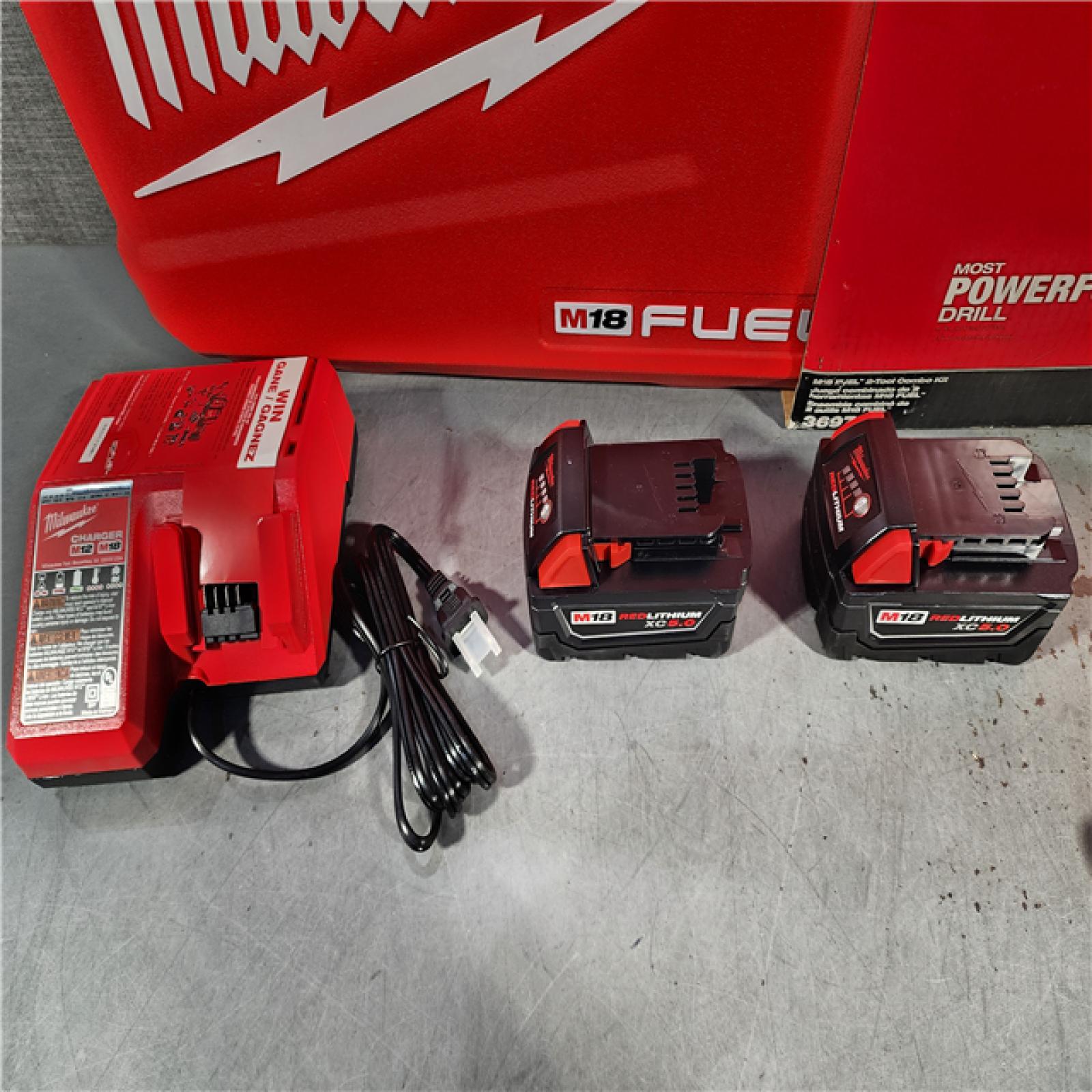 HOUSTON LOCATION - AS-IS Milwaukee M18 FUEL 18V Lithium-Ion Brushless Cordless Hammer Drill and Impact Driver Combo Kit (2-Tool) with 2 Batteries