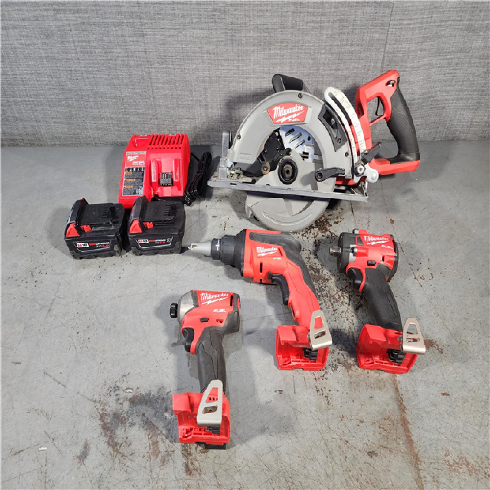 HOUSTON LOCATION - AS-IS MILWAUKEE 4 TOOL COMBO KIT W/ (2) BATTERY & CHARGER