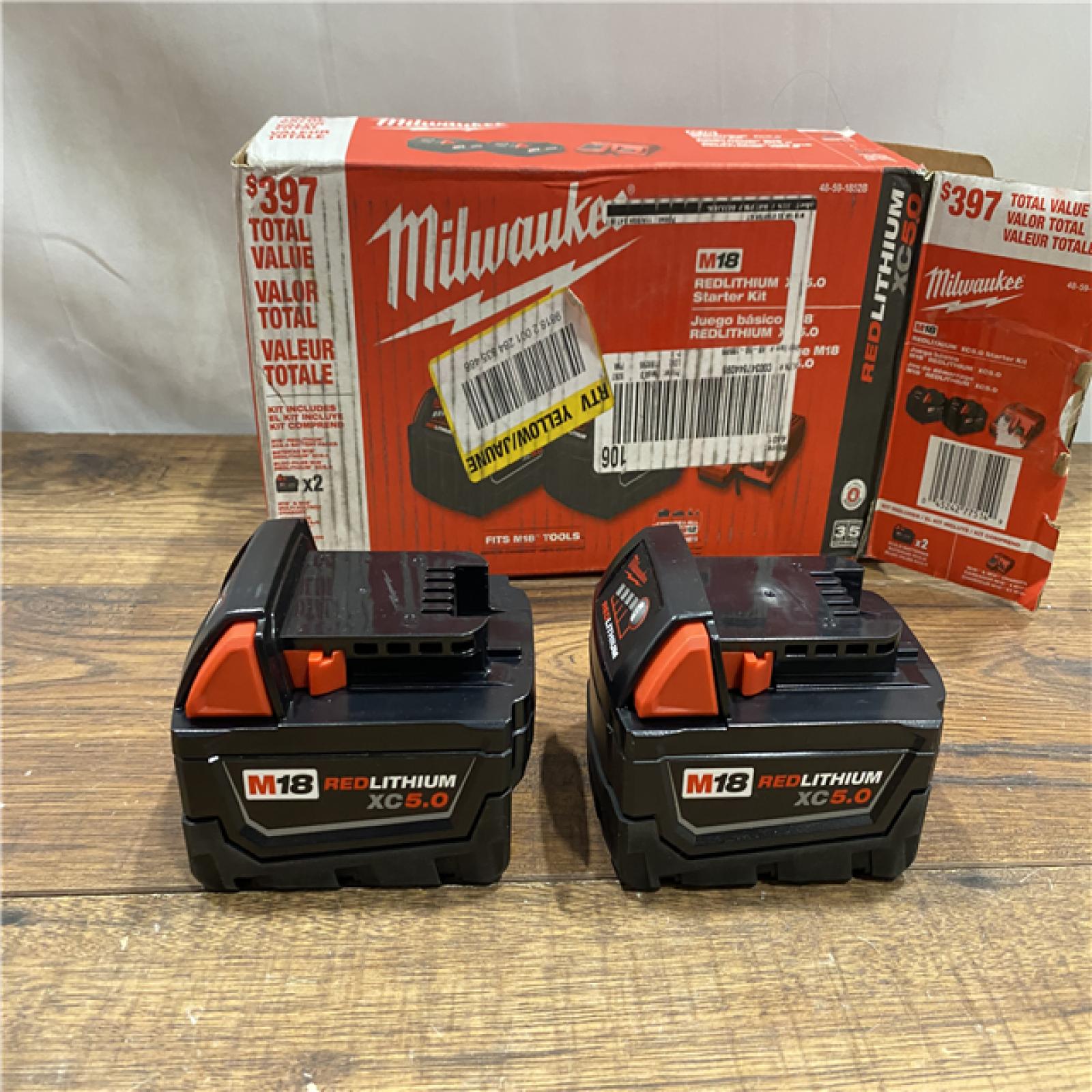 AS IS M18 18-Volt Lithium-Ion XC Starter Kit with Two 5.0Ah Batteries and Charger