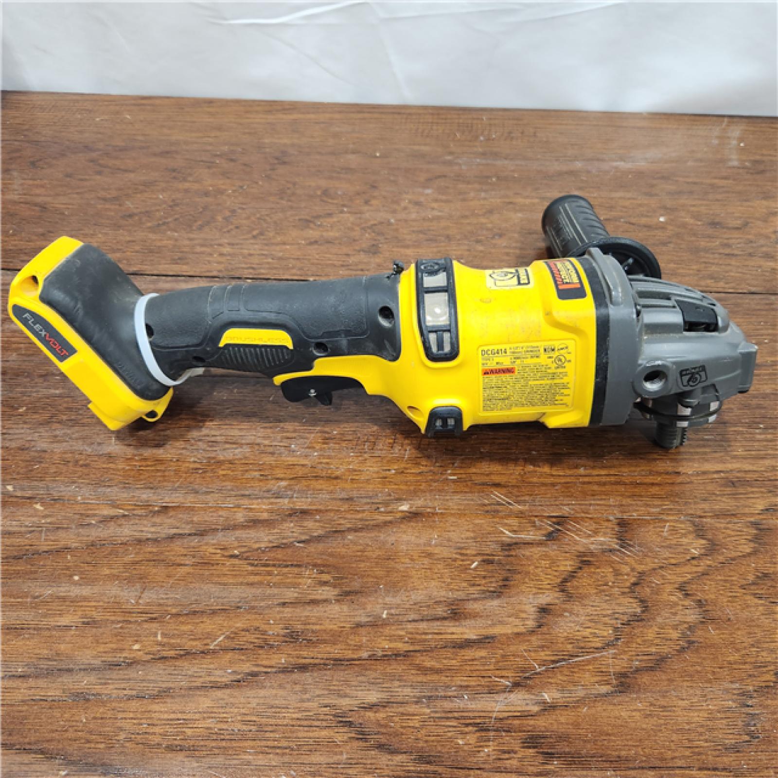 AS-IS Dewalt FLEXVOLT 60-Volt MAX Lithium-Ion Cordless Brushless 4-1/2 in. Angle Grinder with Kickback Brake (Tool-Only)