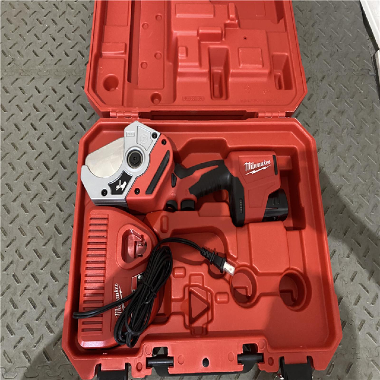 Houston location AS-IS Milwaukee M12 12V Plastic Pipe Shear Kit 2470-21 with 1.5Ah Battery  Charger  & Tool Case