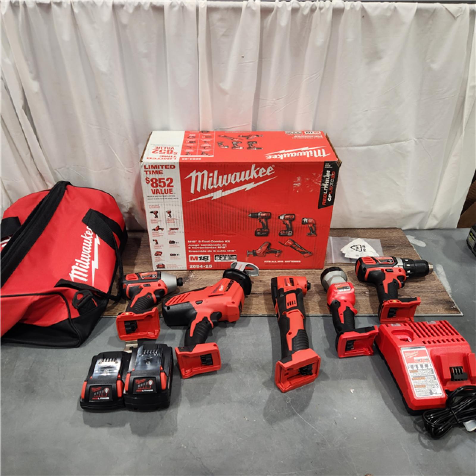 AS IS M18 18V Lithium-Ion Cordless Combo Kit (5-Tool) with (2) Batteries, Charger and Tool Bag