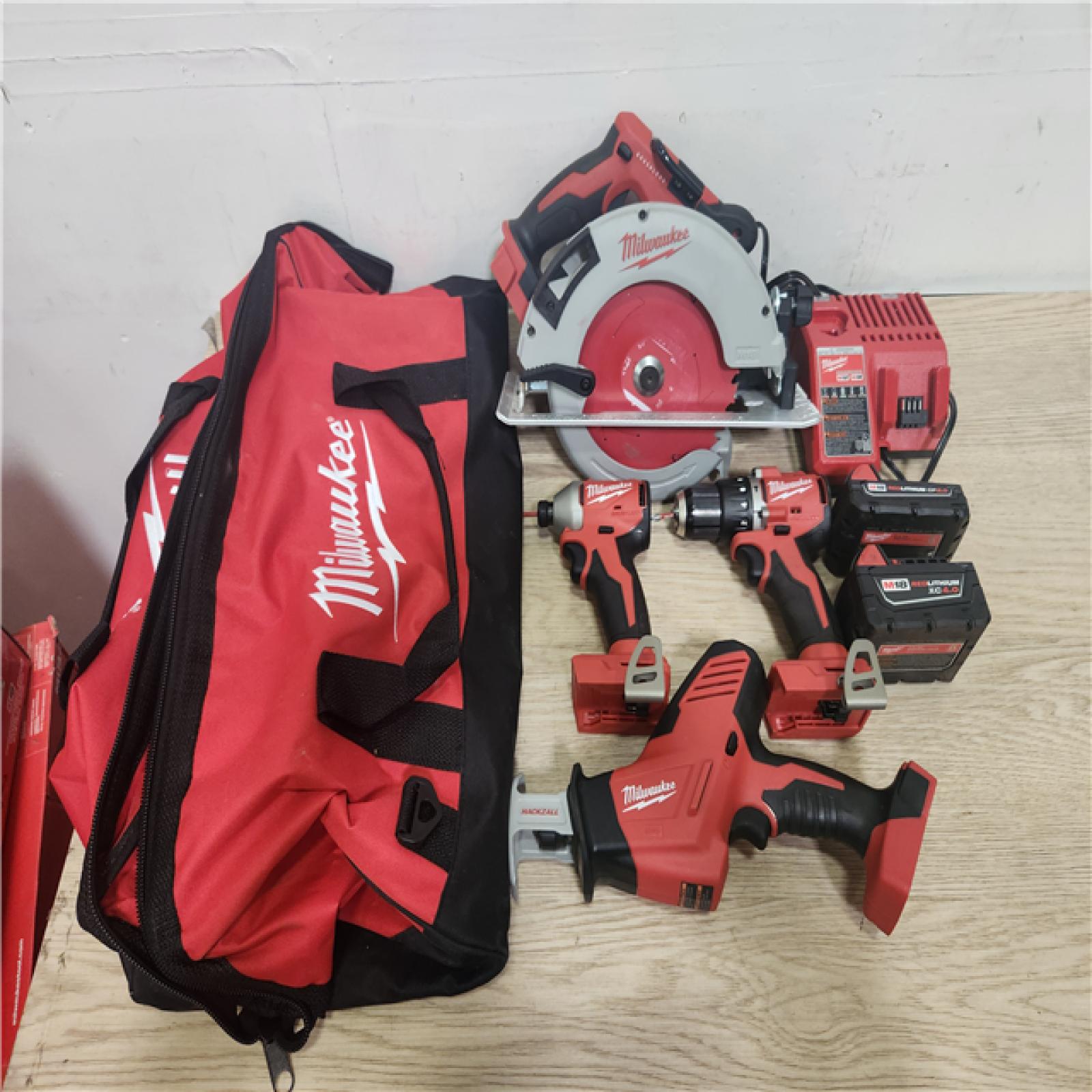 Phoenix Location Milwaukee M18 18-Volt Lithium-Ion Brushless Cordless Combo Kit (4-Tool) with 2-Batteries, 1-Charger and Tool Bag