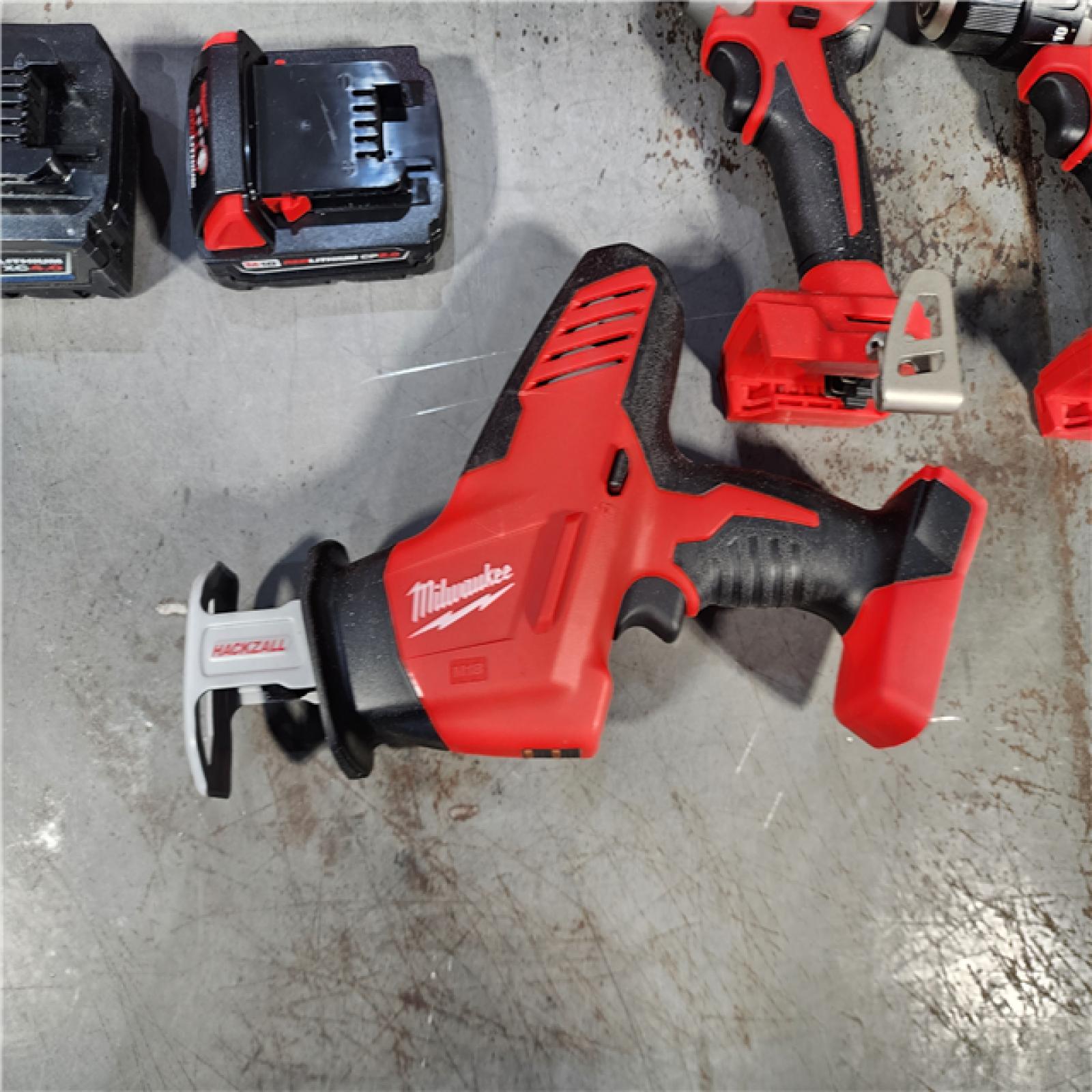 HOUSTON LOCATION - AS-IS (APPEARS LIKE NEW) Milwaukee M18 18-Volt Lithium-Ion Brushless Cordless Combo Kit (4-Tool) with 2-Batteries, 1-Charger and Tool Bag