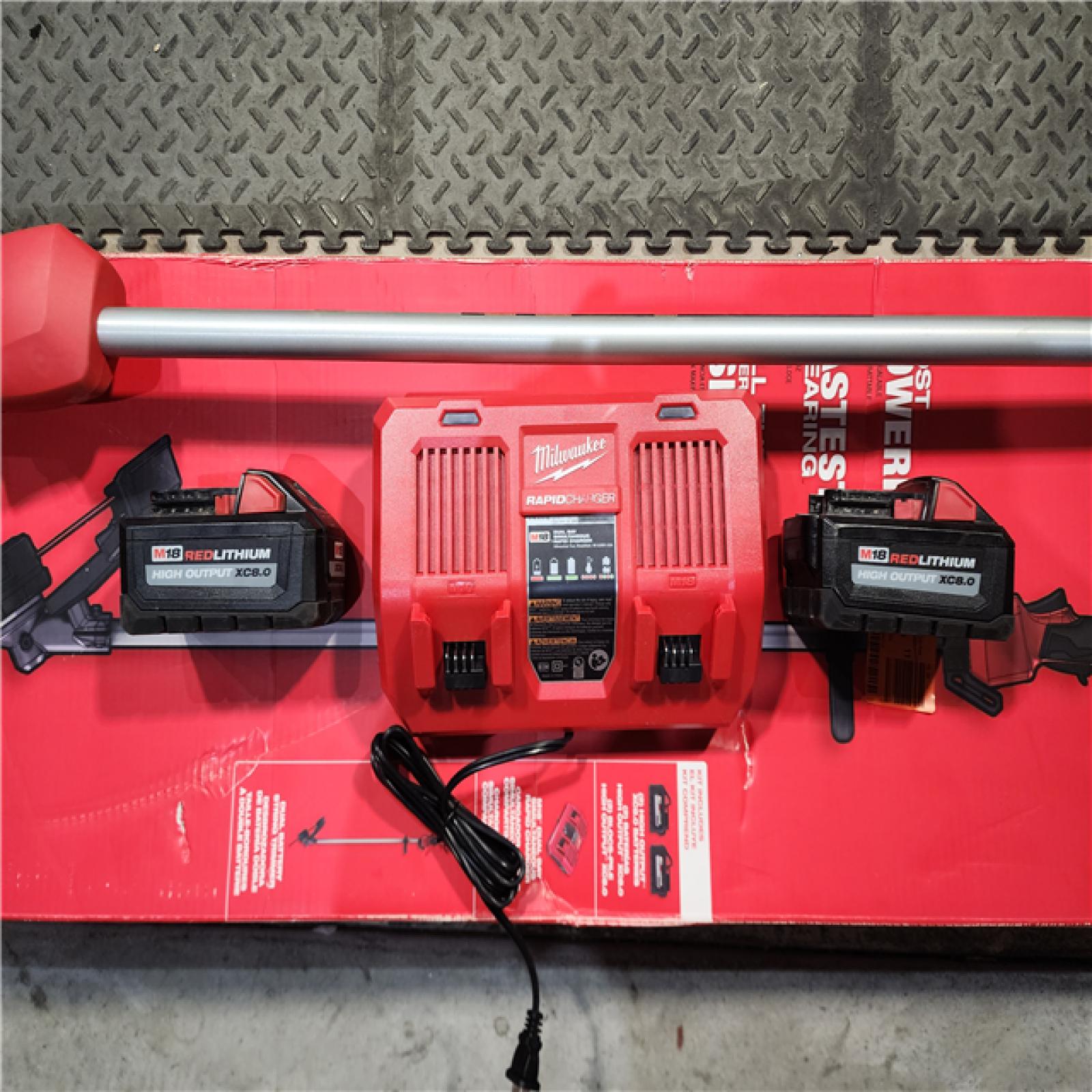 HOUSTON LOCATION - AS-IS (APPEARS LIKE NEW) Milwaukee M18 FUEL 18V Brushless Cordless 17 in. Dual Battery Straight Shaft String Trimmer Kit