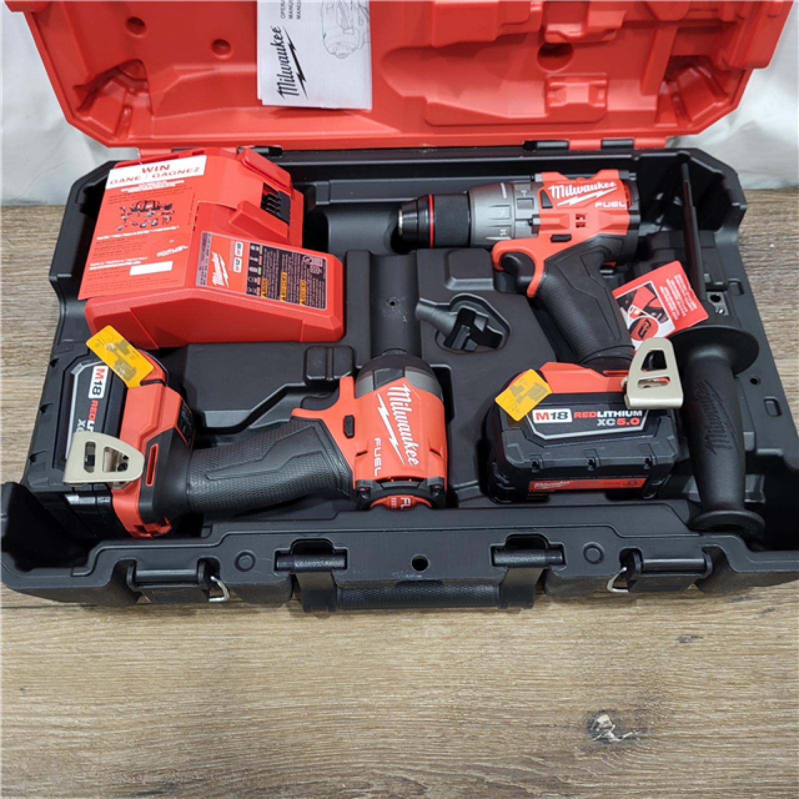 AS-IS M18 FUEL 18V Lithium-Ion Brushless Cordless Hammer Drill and Impact Driver Combo Kit (2-Tool) with 2 Batteries