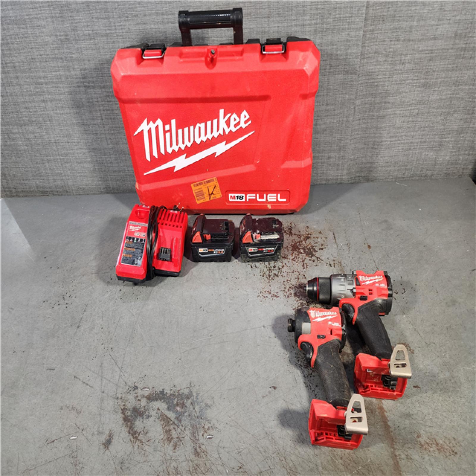 HOUSTON LOCATION - AS-IS Milwaukee M18 FUEL 18V Lithium-Ion Brushless Cordless Hammer Drill and Impact Driver Combo Kit (2-Tool) with 2 Batteries