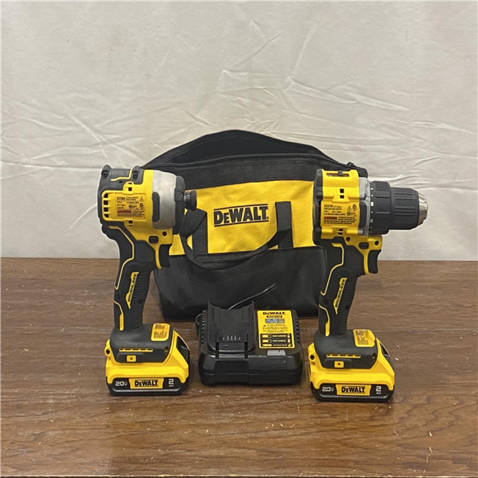 AS-IS DEWALT 20V MAX XR Hammer Drill and ATOMIC Impact Driver 2 Tool Cordless Combo Kit with (2) 4.0Ah Batteries, Charger, and Bag