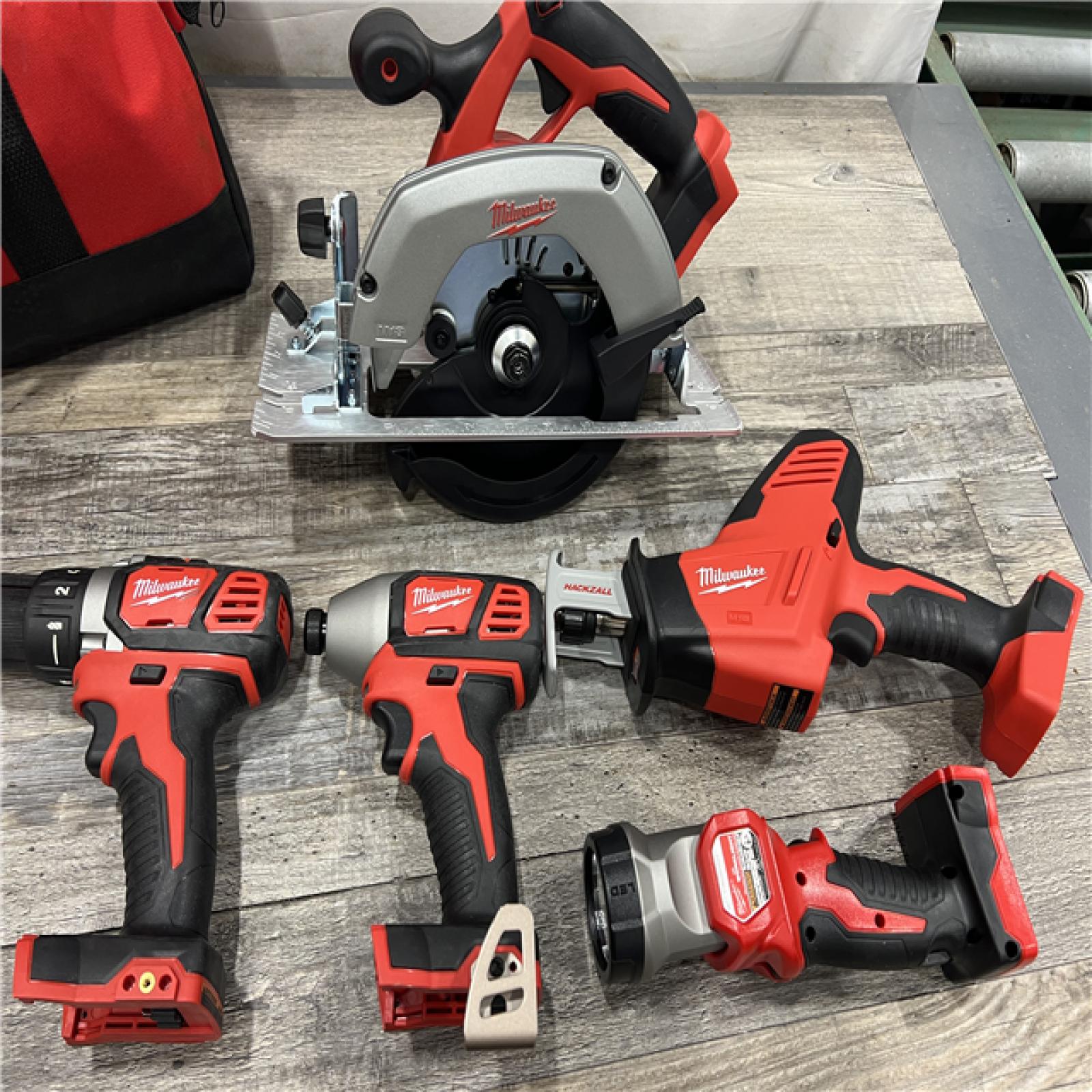 AS-IS Milwaukee M18 18-Volt Lithium-Ion Cordless Combo Tool Kit (5-Tool) with (1) 3.0Ah and (1) 1.5Ah Battery, (1) Charger, (1) Tool Bag