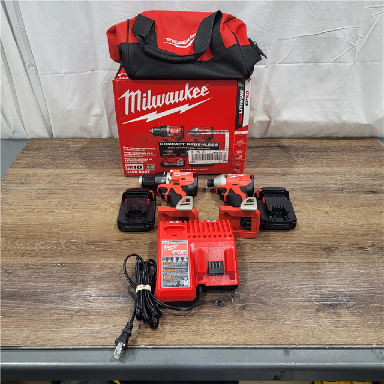 AS-IS M18 18V Lithium-Ion Brushless Cordless Compact Drill/Impact Combo Kit (2-Tool) W/(2) 2.0 Ah Batteries, Charger & Bag