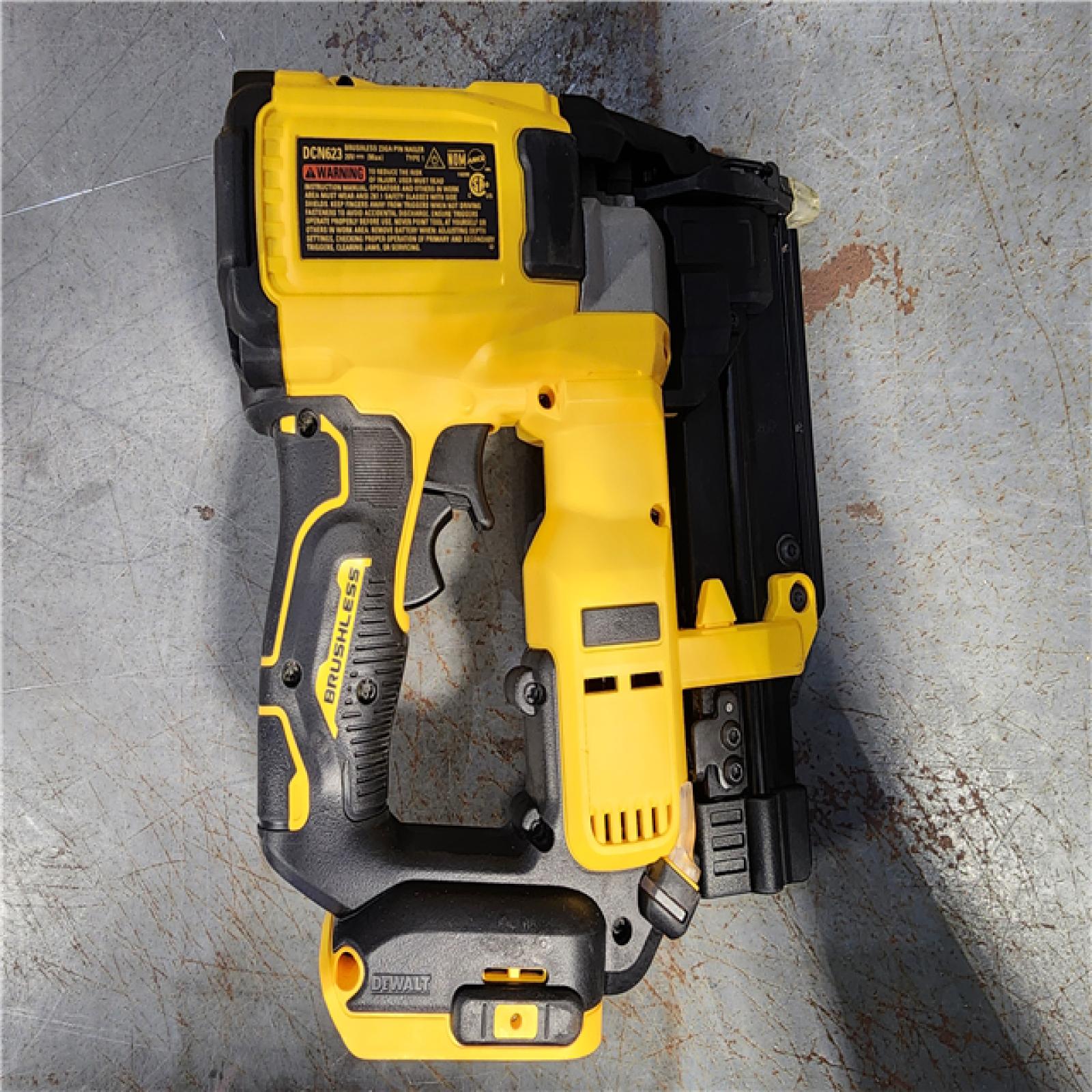 HOUSTON LOCATION - AS-IS DEWALT ATOMIC 20V MAX Lithium Ion Cordless 23 Gauge Pin Nailer Kit with 2.0Ah Battery and Charger