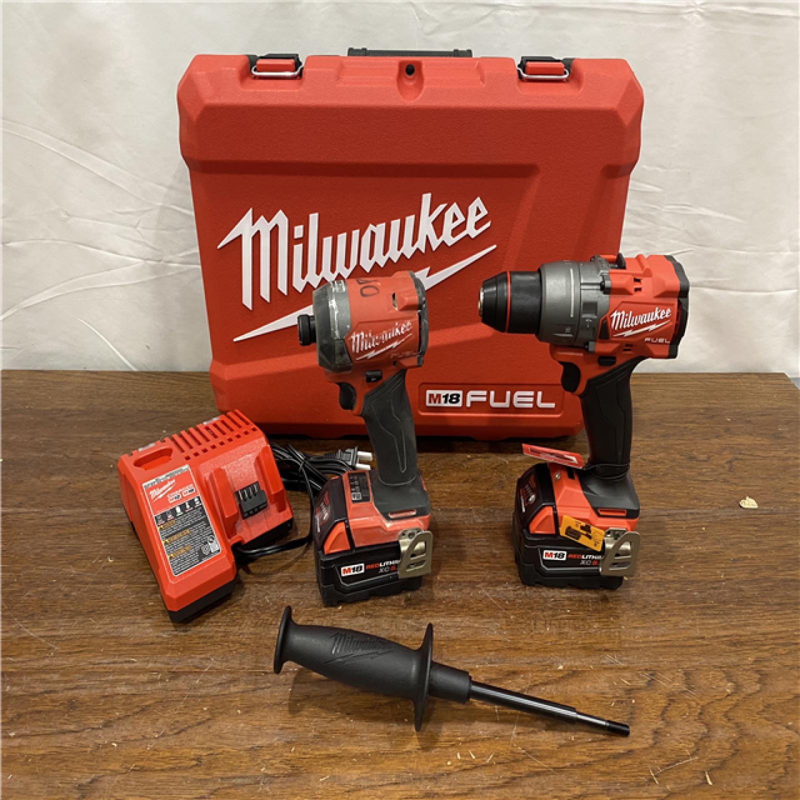 AS-IS Milwaukee M18 FUEL 18V Lithium-Ion Brushless Cordless Hammer Drill and Impact Driver Combo Kit (2-Tool) with 2 Batteries