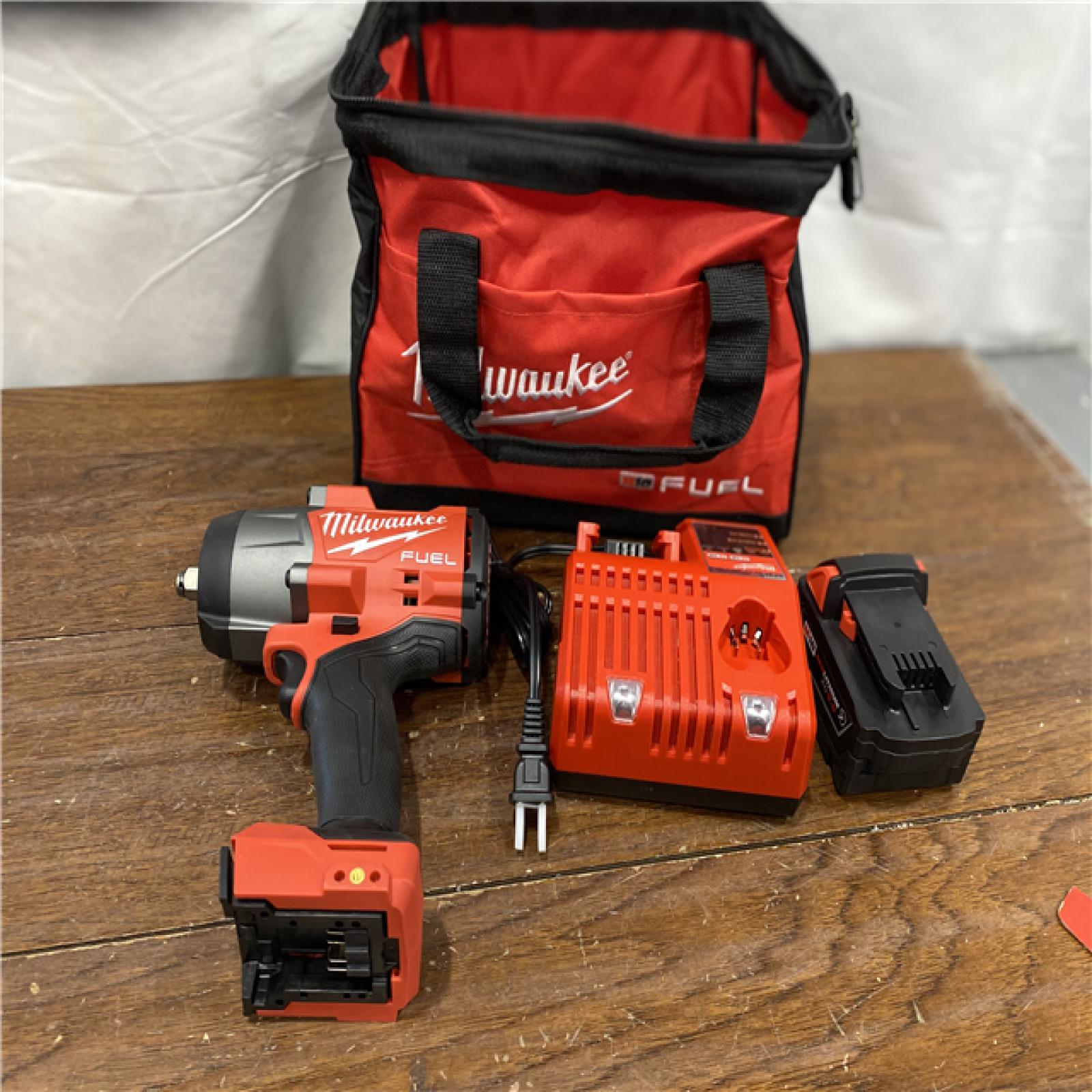 AS-ISMilwaukee M18 1/2 in. Cordless Brushless High Torque Impact Wrench Kit (Battery & Charger)