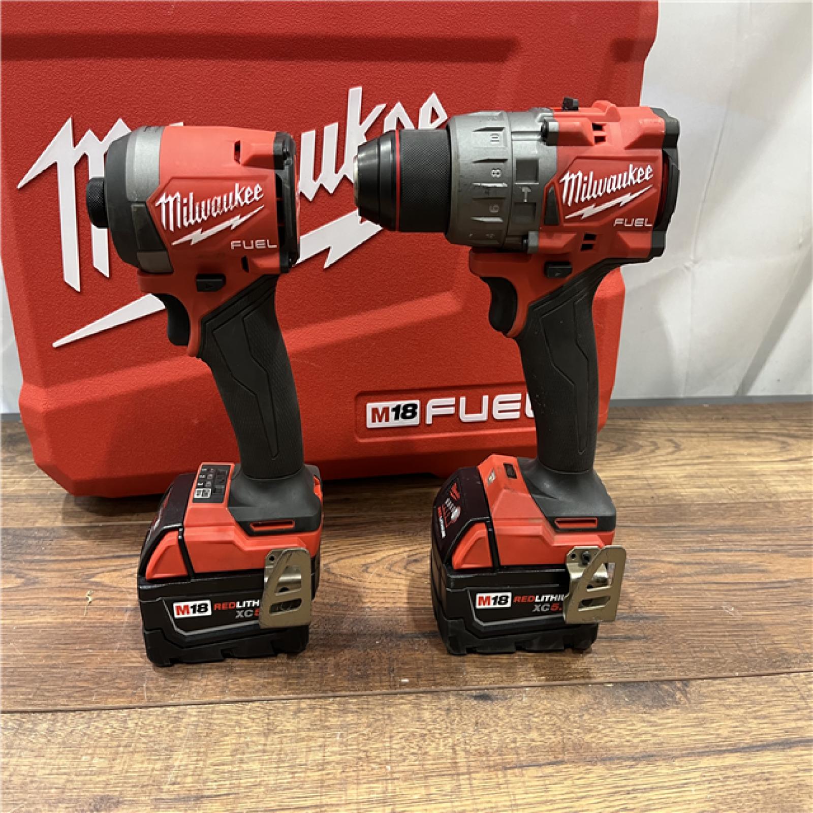 AS-IS Milwaukee M18 FUEL 18V Lithium-Ion Brushless Cordless Hammer Drill and Impact Driver Combo Kit (2-Tool) with 2 Batteries