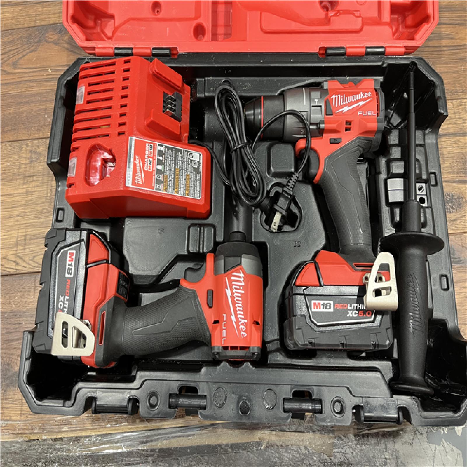 AS-IS Milwaukee M18 FUEL 18V Lithium-Ion Brushless Cordless Hammer Drill and Impact Driver Combo Kit (2-Tool) with 2 Batteries