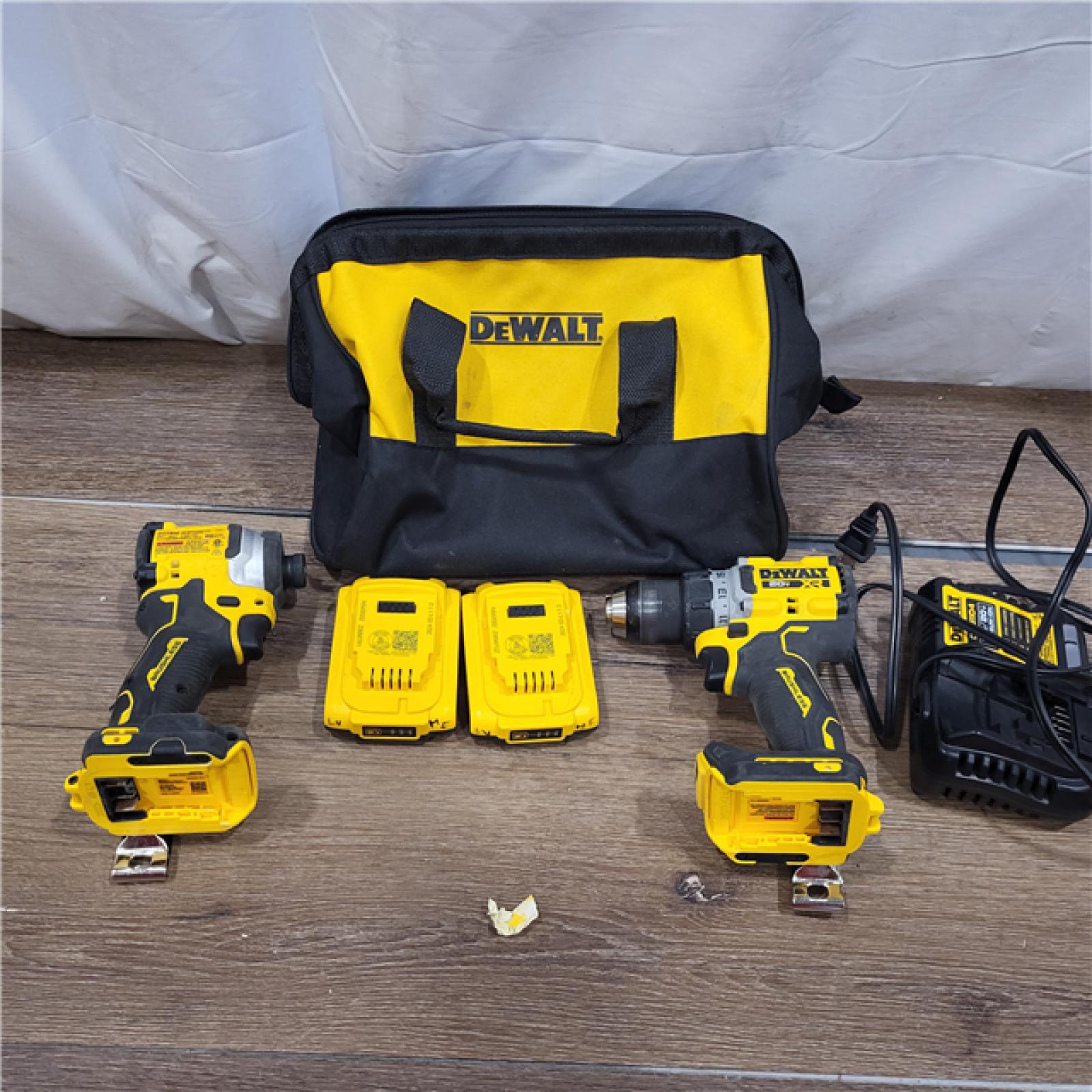 AS-IS DEWALT 20V MAX XR Cordless Drill/Driver, ATOMIC Impact Driver 2 Tool Combo Kit, (2) 2.0Ah Batteries, Charger, and Bag