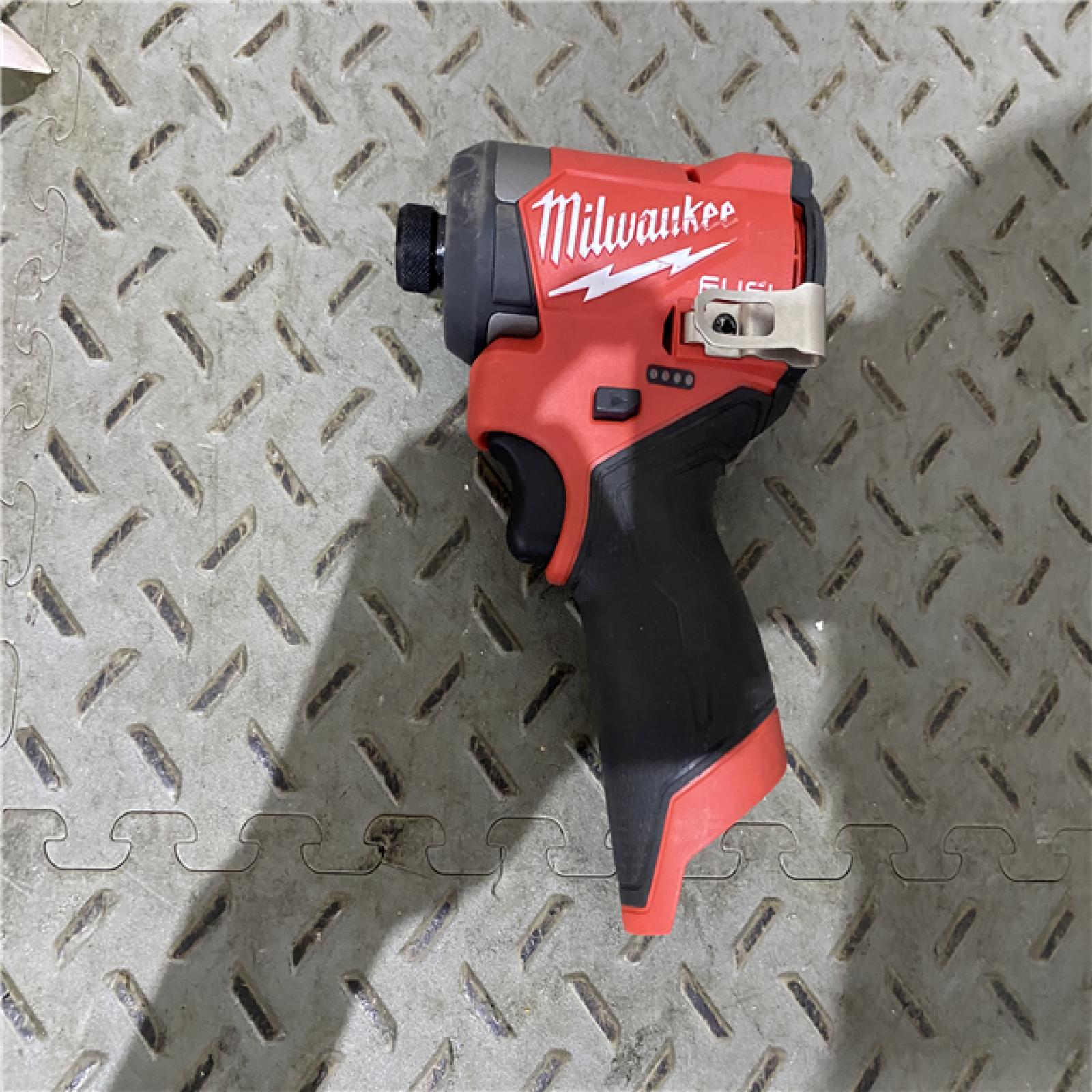 Houston location AS-IS  MILWAUKEE M12 Fuel Atornillador De Impacto Hexagonal De 1/4