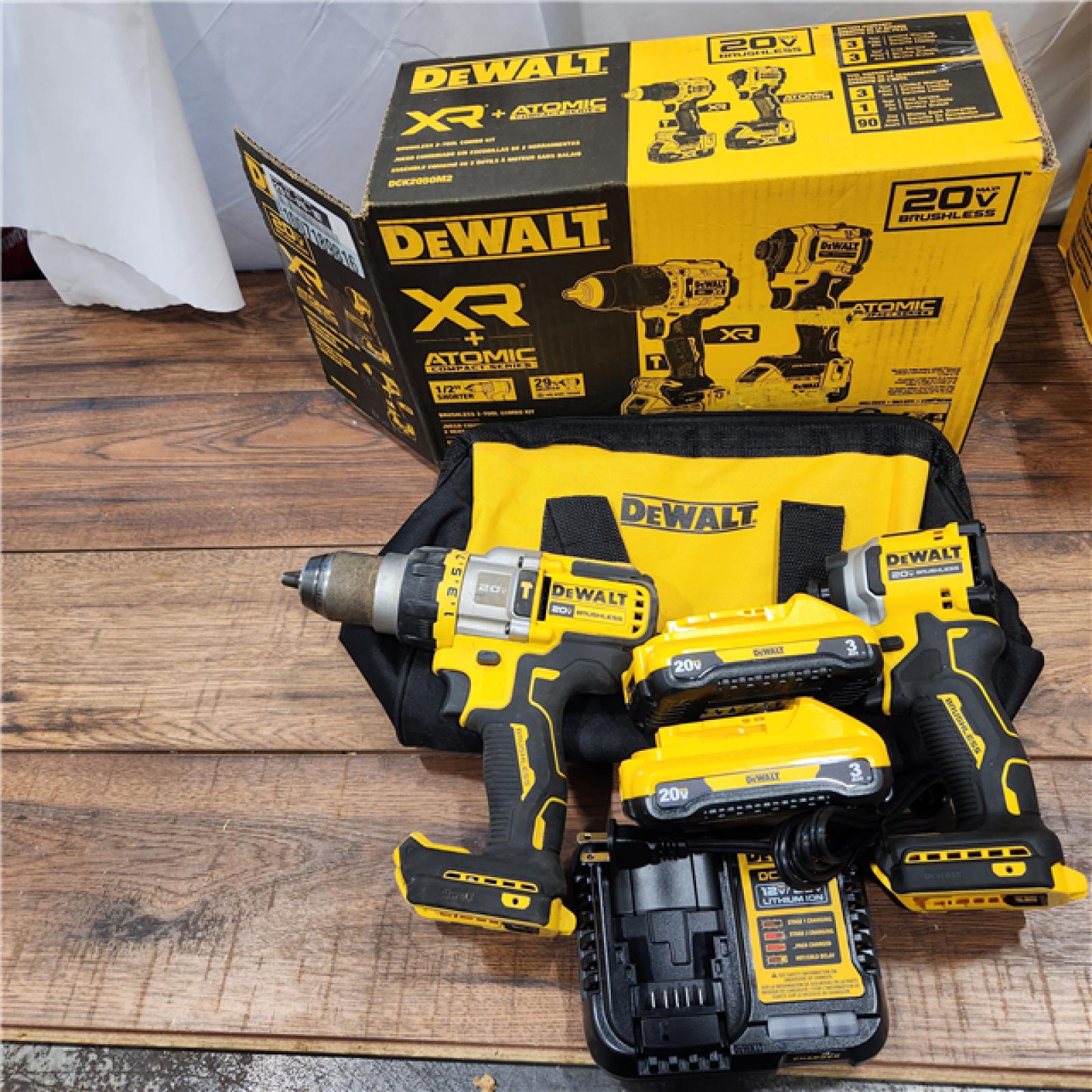 AS-IS 20V MAX XR Hammer Drill and ATOMIC Impact Driver 2 Tool Cordless Combo Kit with (2) 4.0Ah Batteries, Charger, and Bag