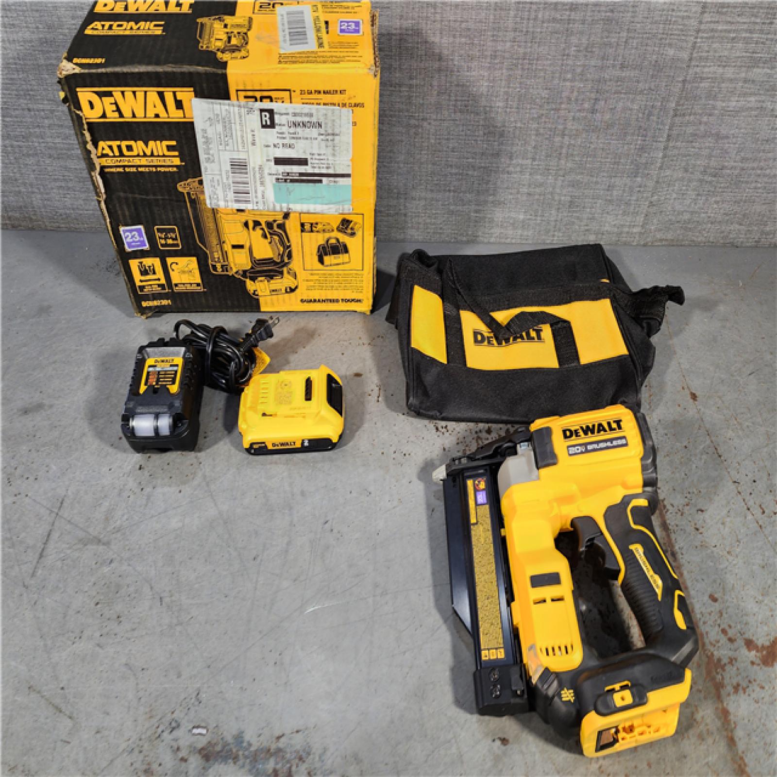 HOUSTON LOCATION - AS-IS DEWALT ATOMIC 20V MAX Lithium Ion Cordless 23 Gauge Pin Nailer Kit with 2.0Ah Battery and Charger