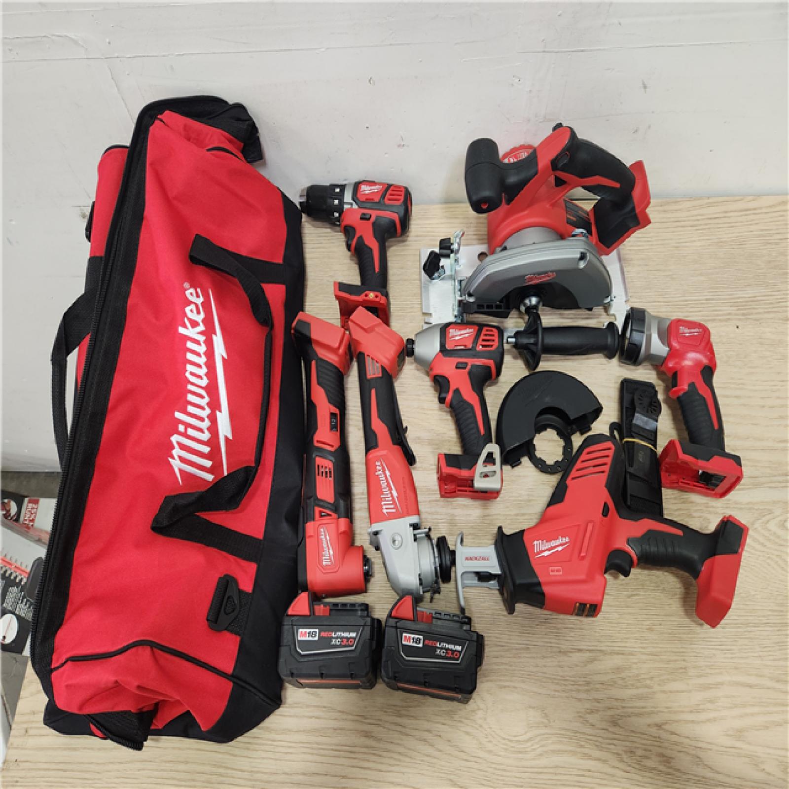 Phoenix Location Milwaukee M18 18-Volt Lithium-Ion Cordless Combo Kit 7-Tool with 2-Batteries, Charger and Tool Bag