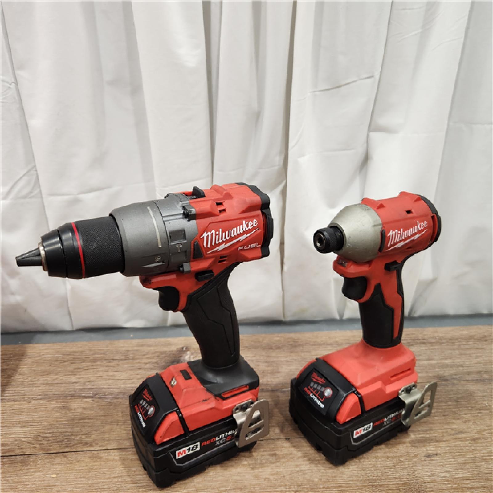 AS-IS Milwaukee M18 FUEL 18V Lithium-Ion Brushless Cordless Hammer Drill and Impact Driver Combo Kit (2-Tool) with 2 Batteries