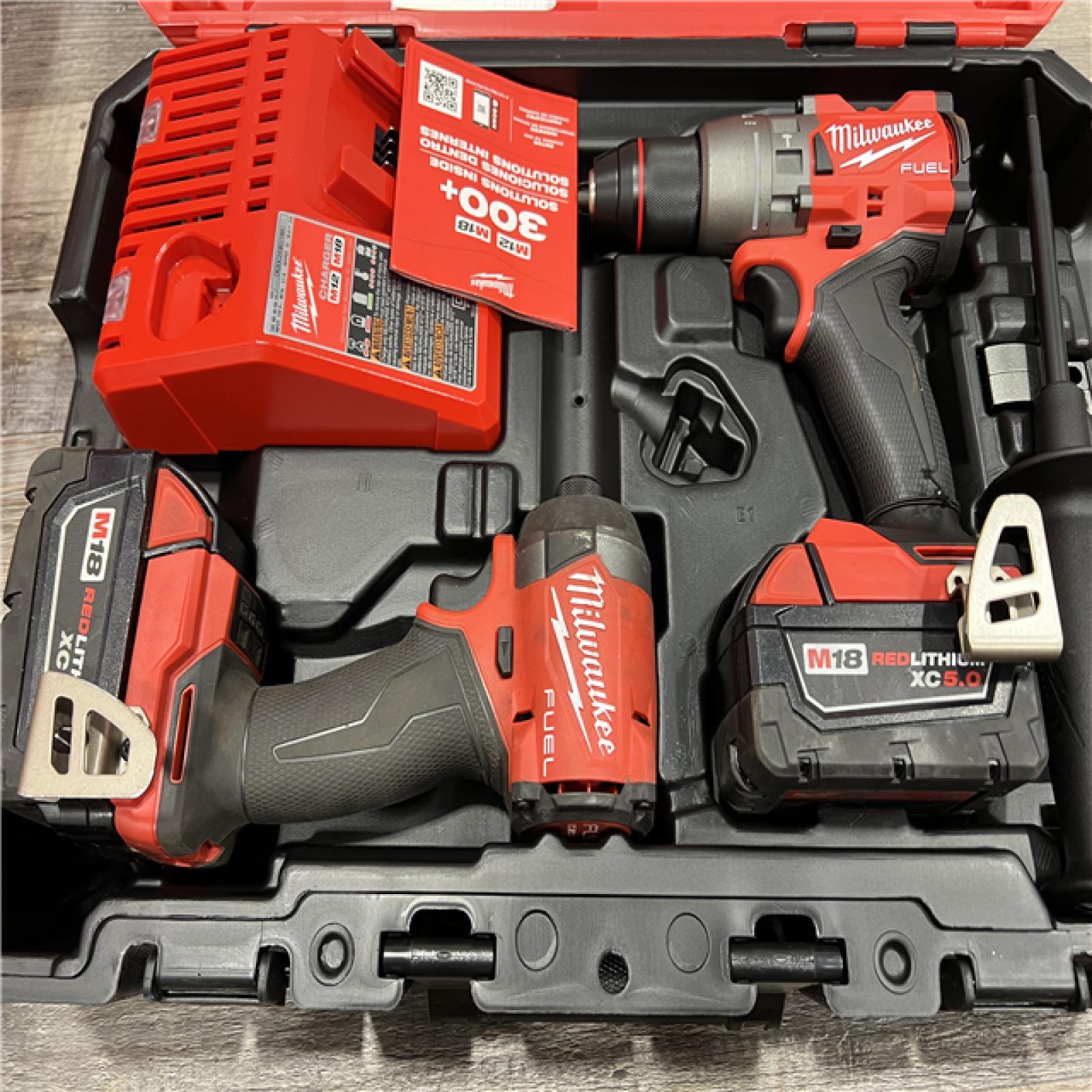 AS-IS Milwaukee M18 FUEL 18V Lithium-Ion Brushless Cordless Hammer Drill and Impact Driver Combo Kit (2-Tool) with 2 Batteries