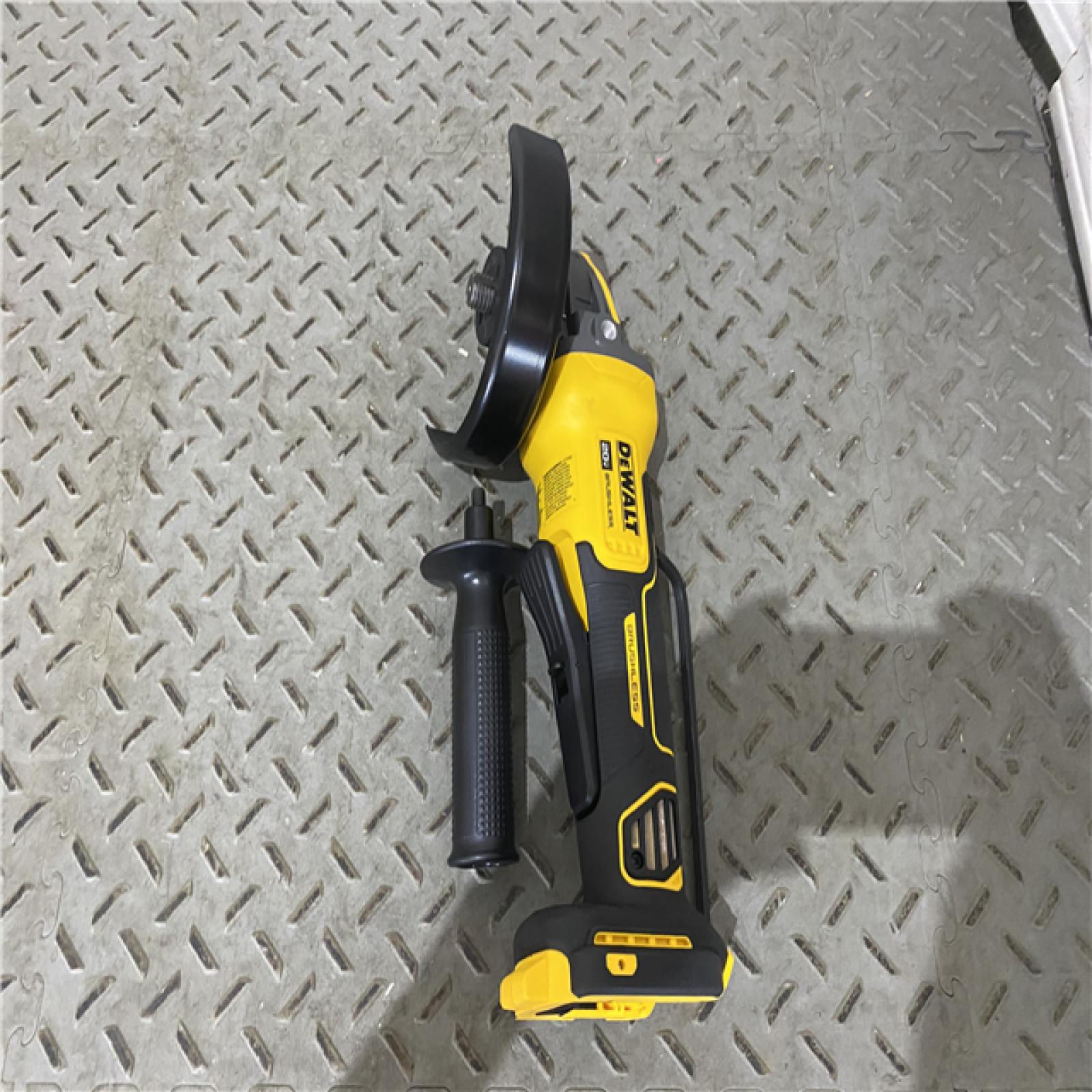 Houston location AS-IS DEWALT 20V MAX Cordless Brushless 4.5 - 5 in. Paddle Switch Angle Grinder with FLEXVOLT ADVANTAGE (Tool Only)