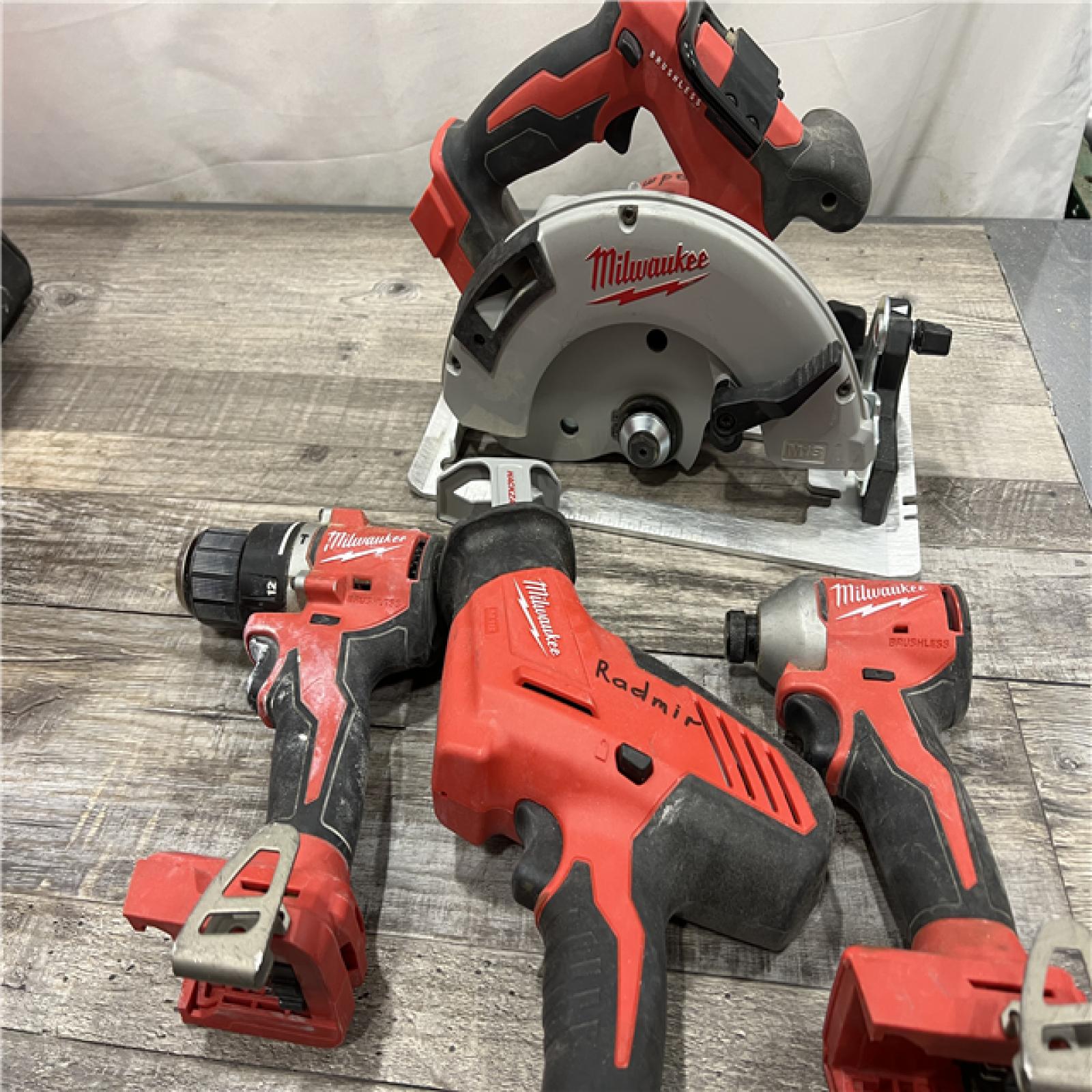 AS-IS Milwaukee M18 18-Volt Lithium-Ion Brushless Cordless Combo Kit (4-Tool) with 2-Batteries, 1-Charger and Tool Bag