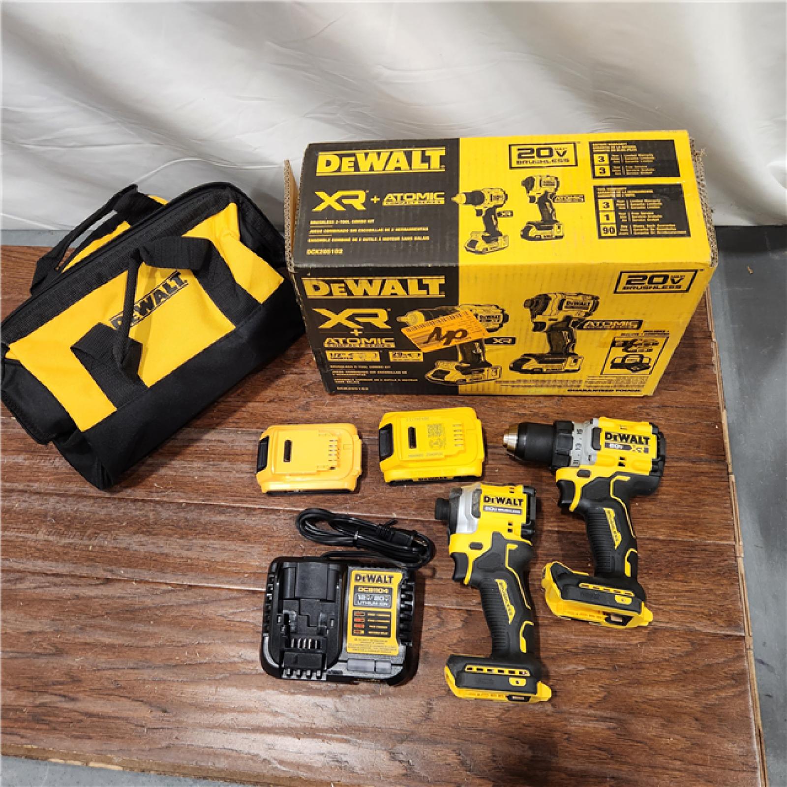 AS-IS DEWALT 20V MAX XR Cordless Drill/Driver, ATOMIC Impact Driver 2 Tool Combo Kit, (2) 2.0Ah Batteries, Charger, and Bag