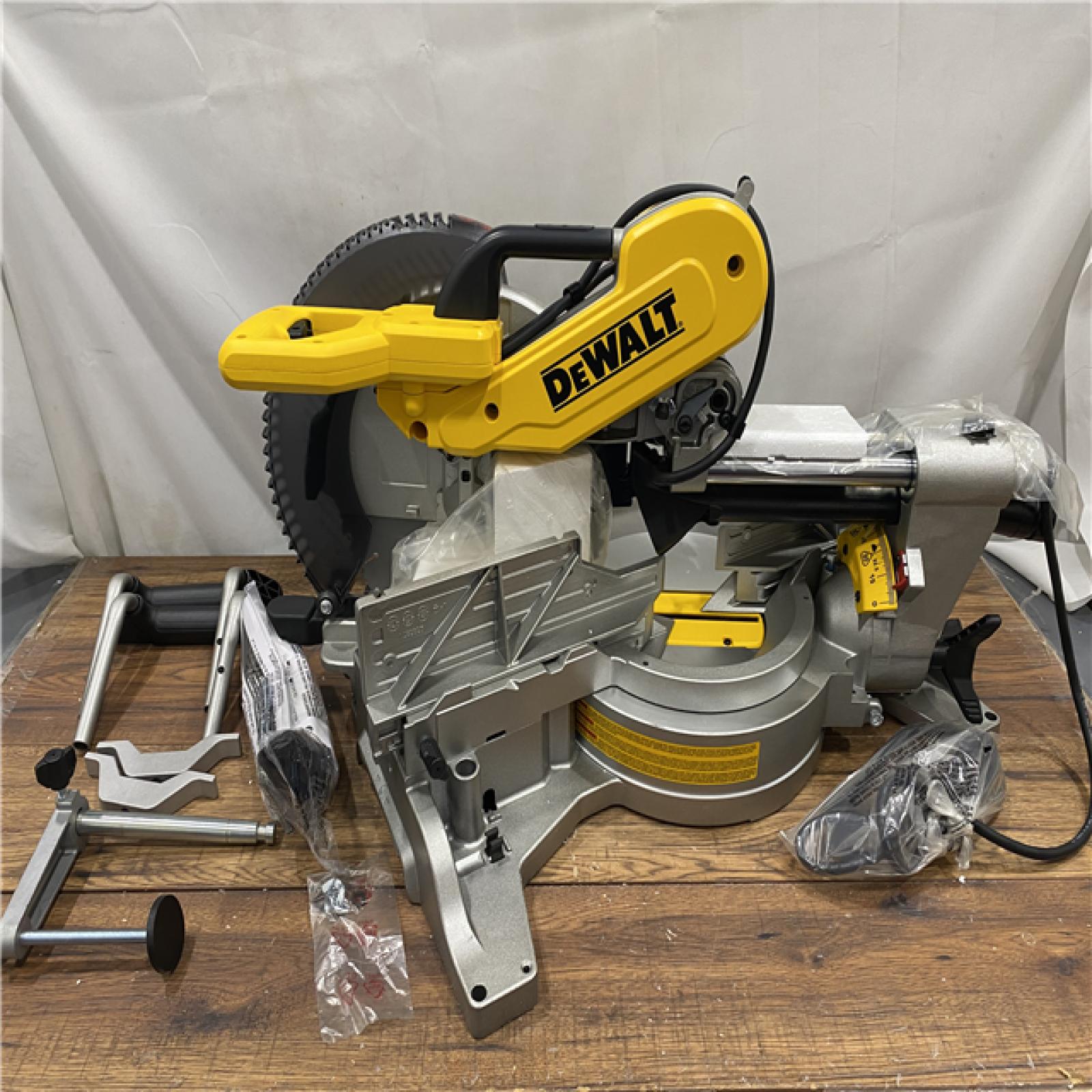 AS IS DEWALT 15 Amp Corded 12 in. Double Bevel Sliding Compound Miter Saw, Blade Wrench and Material Clamp