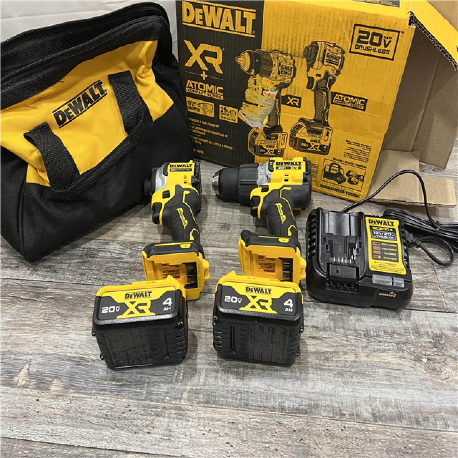 AS-IS DEWALT 20V MAX XR Hammer Drill and ATOMIC Impact Driver 2 Tool Cordless Combo Kit with (2) 4.0Ah Batteries, Charger, and Bag